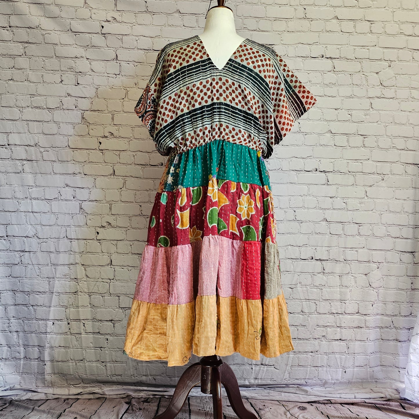 Twillow Desert Bloom Kantha Midi Dress with striped and dotted bodice, multicolor patchwork skirt, and Kantha stitching detail.