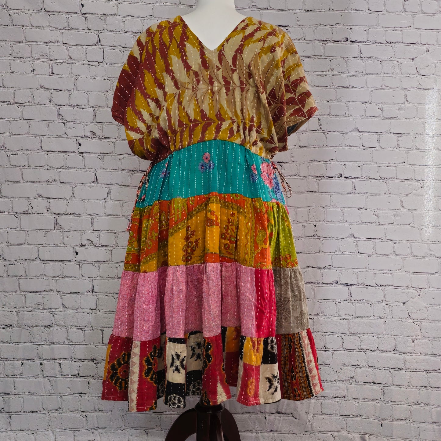 Twillow Autumn Mosaic Kantha Midi Dress with earthy brown top and multicolor patchwork skirt featuring traditional Kantha stitching.