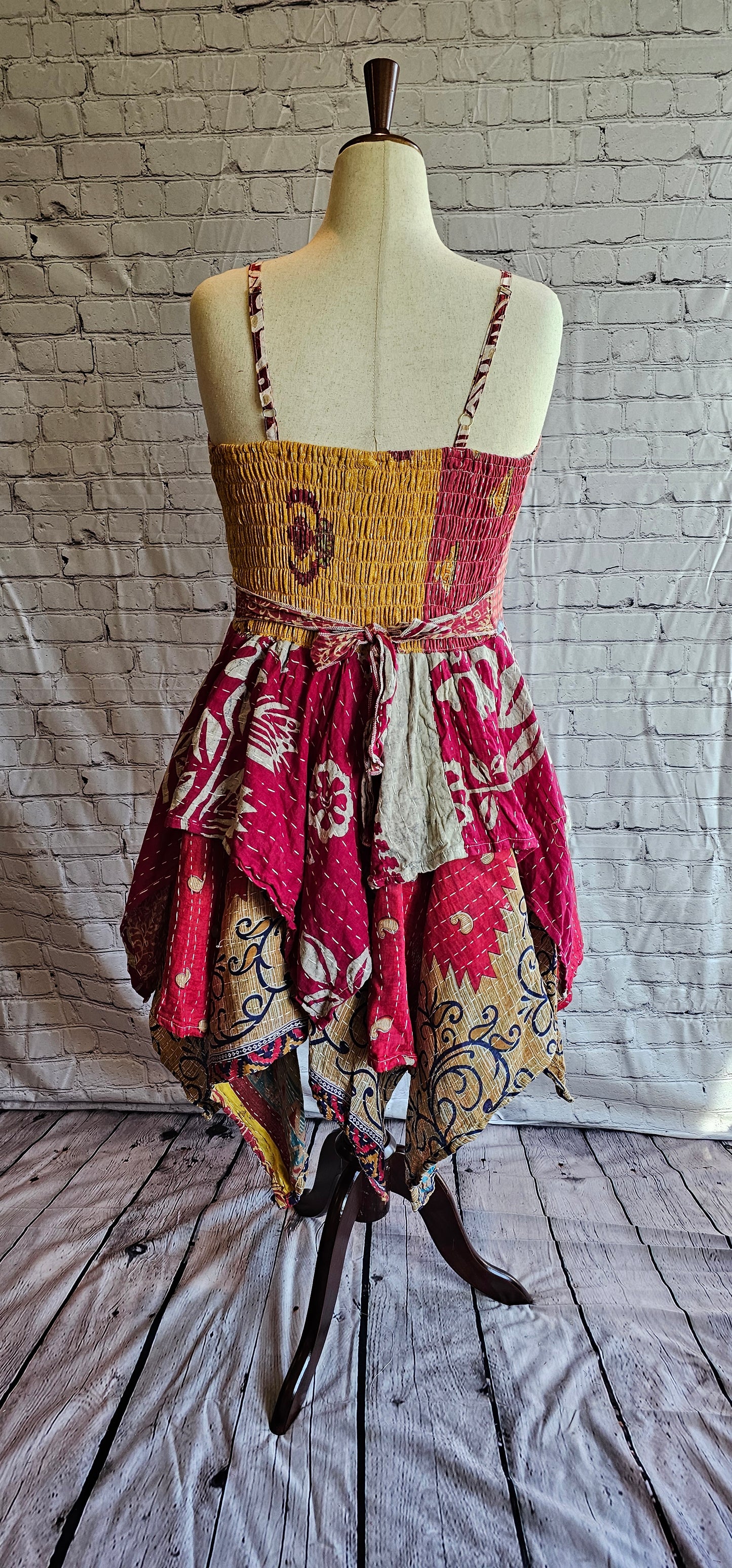 Krysta patchwork Kantha dress back view, one-of-a-kind boho fashion in handkerchief hem.