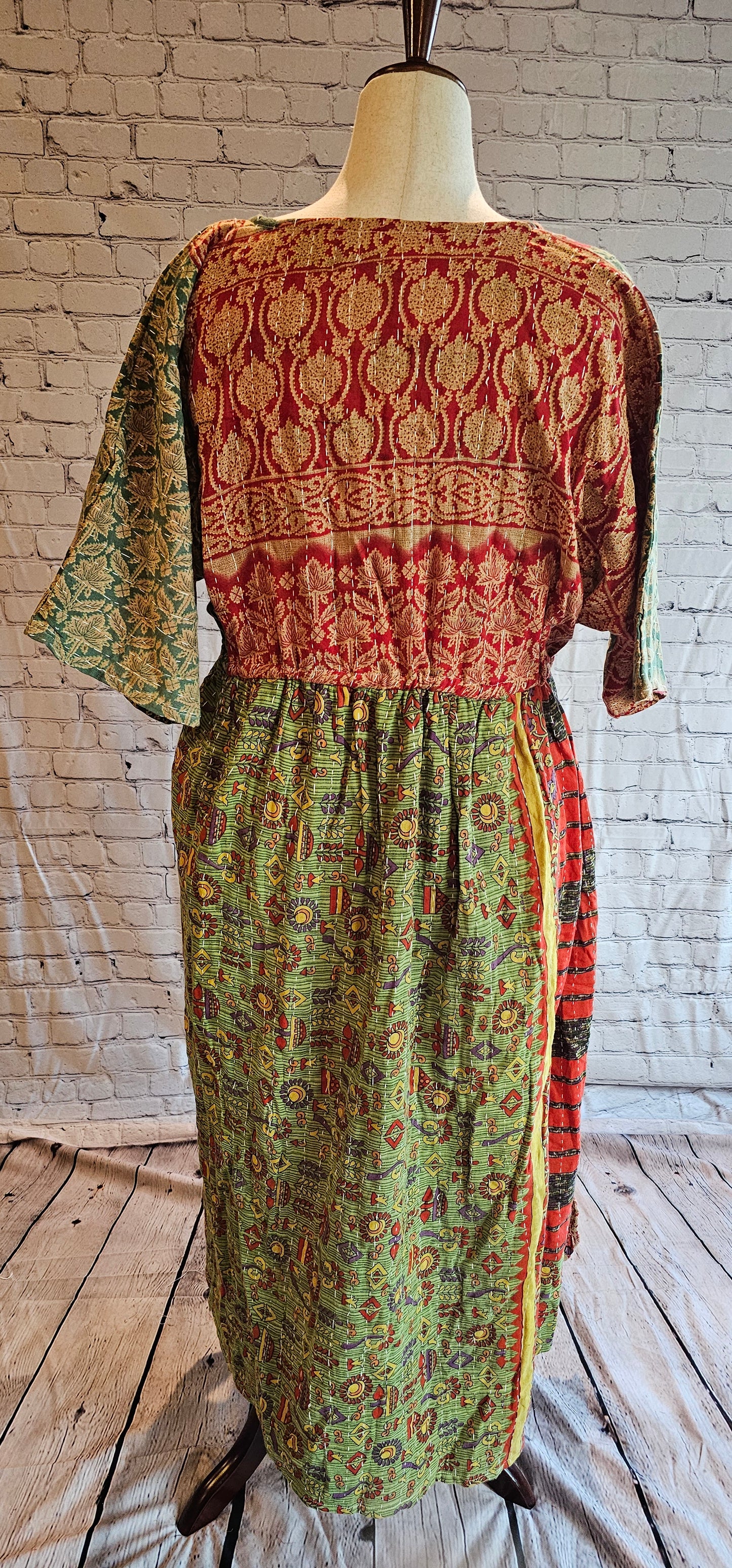 Mosswynd cotton Kantha dress back, bohemian patchwork design with flowing fit.