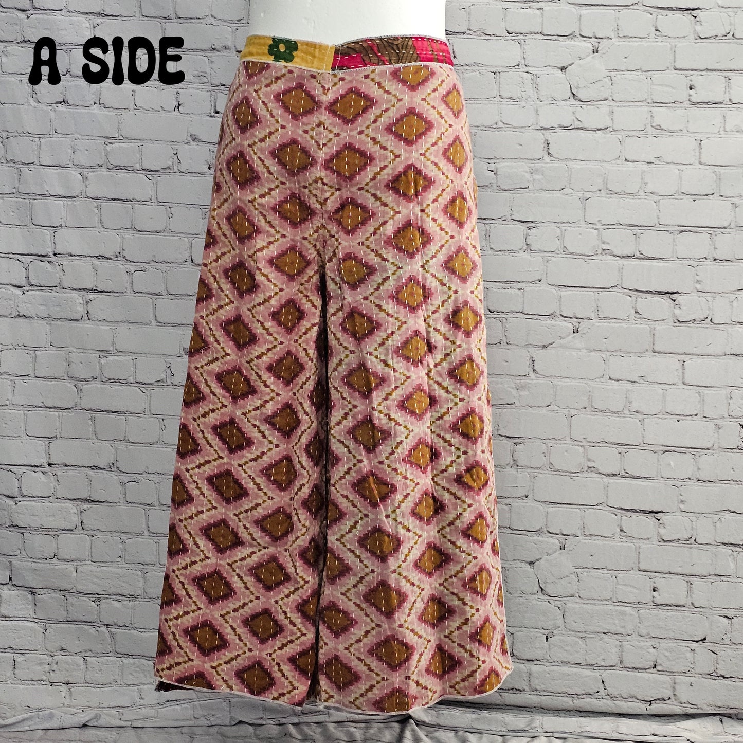 Bohemian reversible Kantha wrap pants on model, eco-friendly unisex loungewear.