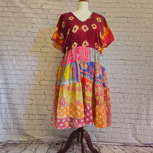 Twillow Sunset Reverie Kantha Midi Dress featuring maroon and multicolor boho patchwork panels, V-neck, and Kantha stitching accents.