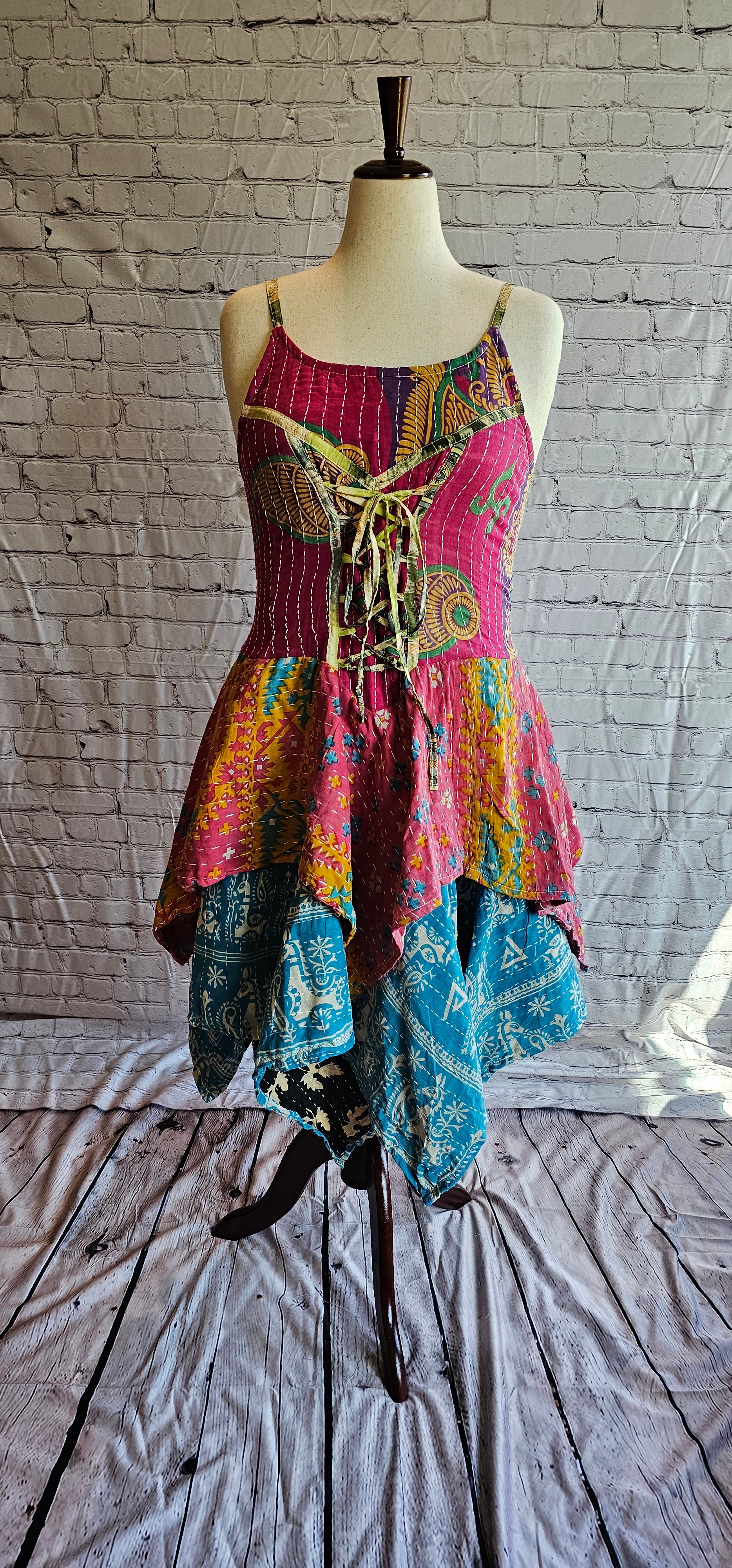 Krysta Kantha dress, front view showing bohemian patchwork and handkerchief hem.