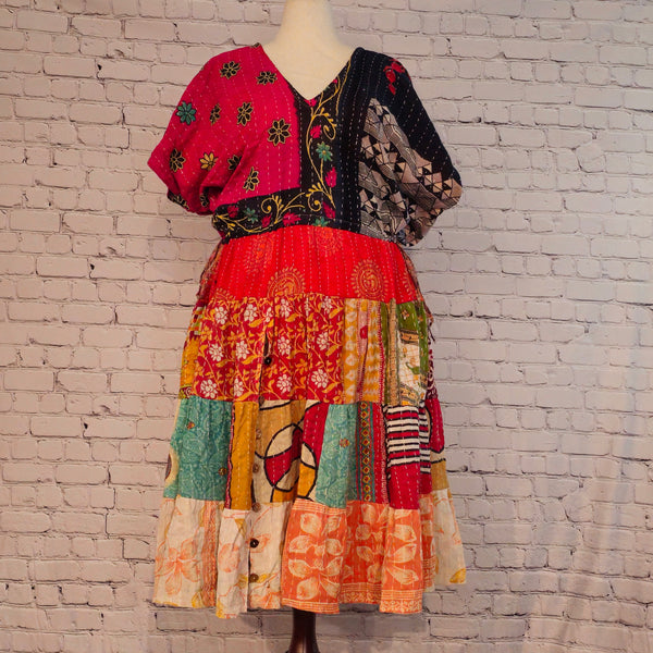 Twillow Midnight Bloom Kantha Midi Dress with pink and black floral bodice and multicolor patchwork skirt featuring Kantha stitching detail.