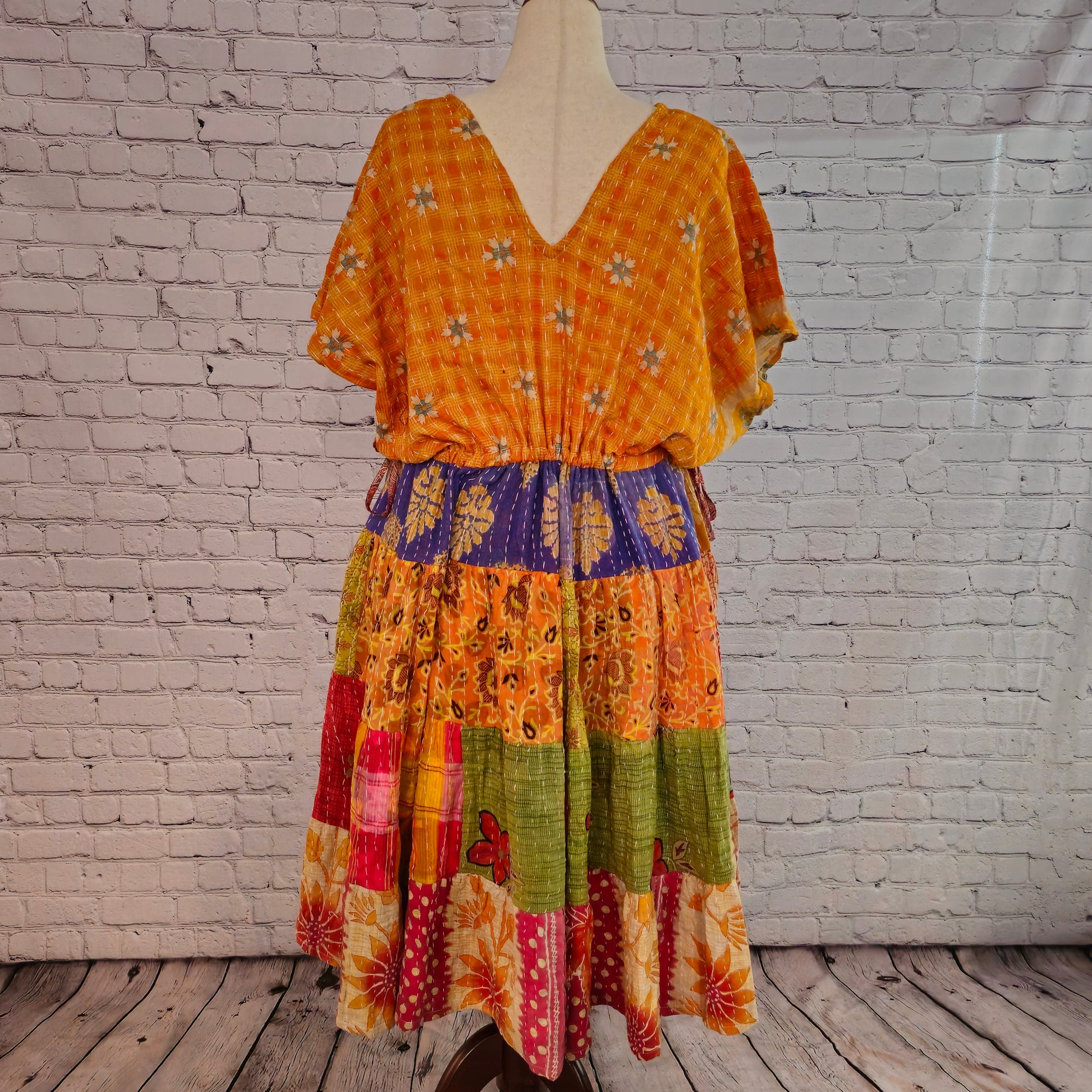 Twillow Golden Meadow Kantha Midi Dress with yellow bodice and multicolor patchwork skirt featuring Kantha stitching and boho silhouette.