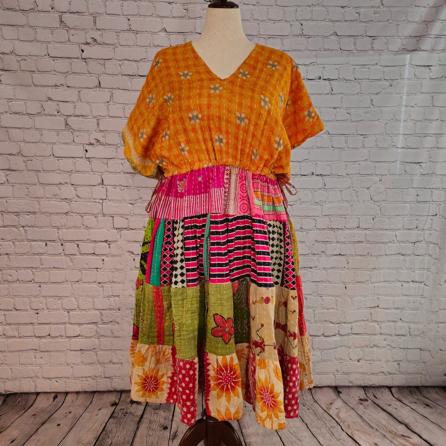 Twillow Golden Meadow Kantha Midi Dress with yellow bodice and multicolor patchwork skirt featuring Kantha stitching and boho silhouette.