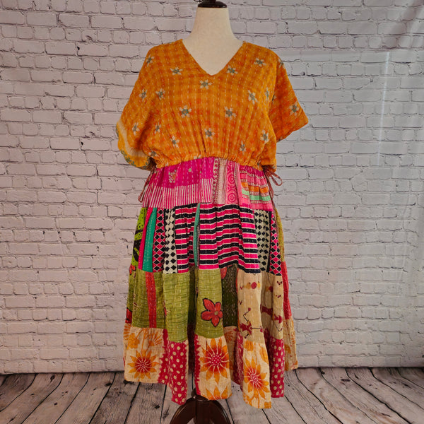 Twillow Golden Meadow Kantha Midi Dress with yellow bodice and multicolor patchwork skirt featuring Kantha stitching and boho silhouette.