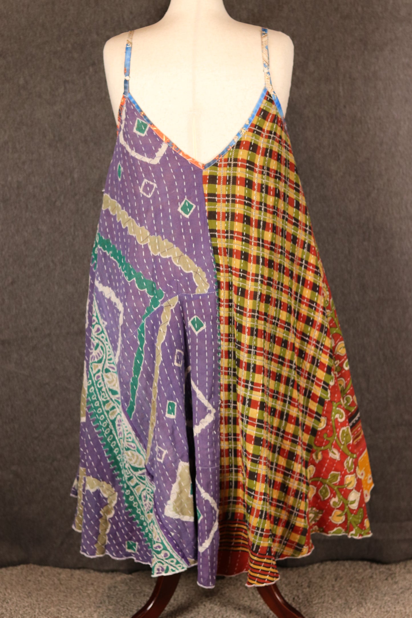 Sora Kantha dress, back view showing patchwork design and flowy cut.
