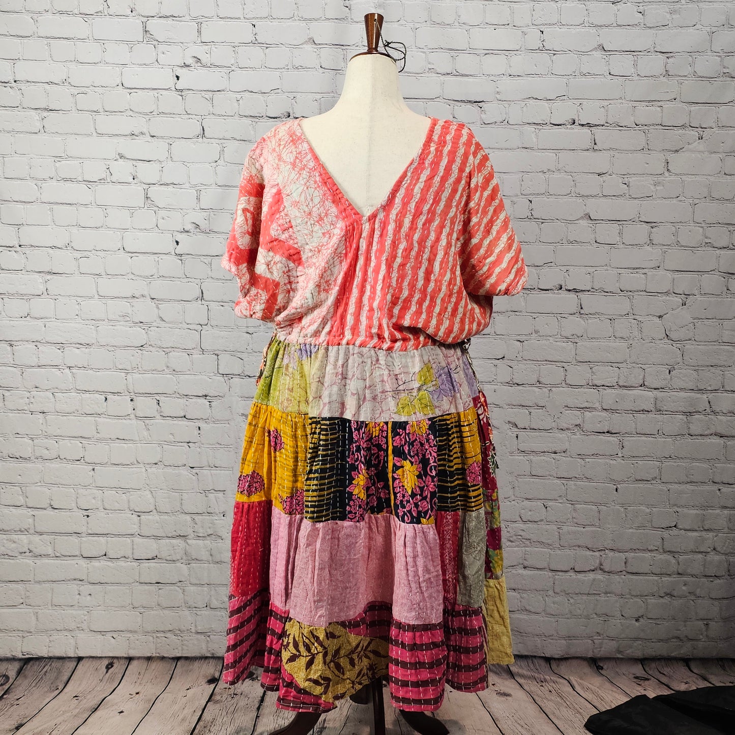 Twillow Sorbet Daydream Kantha Midi Dress with coral striped top and multicolor boho patchwork skirt accented with Kantha stitching.