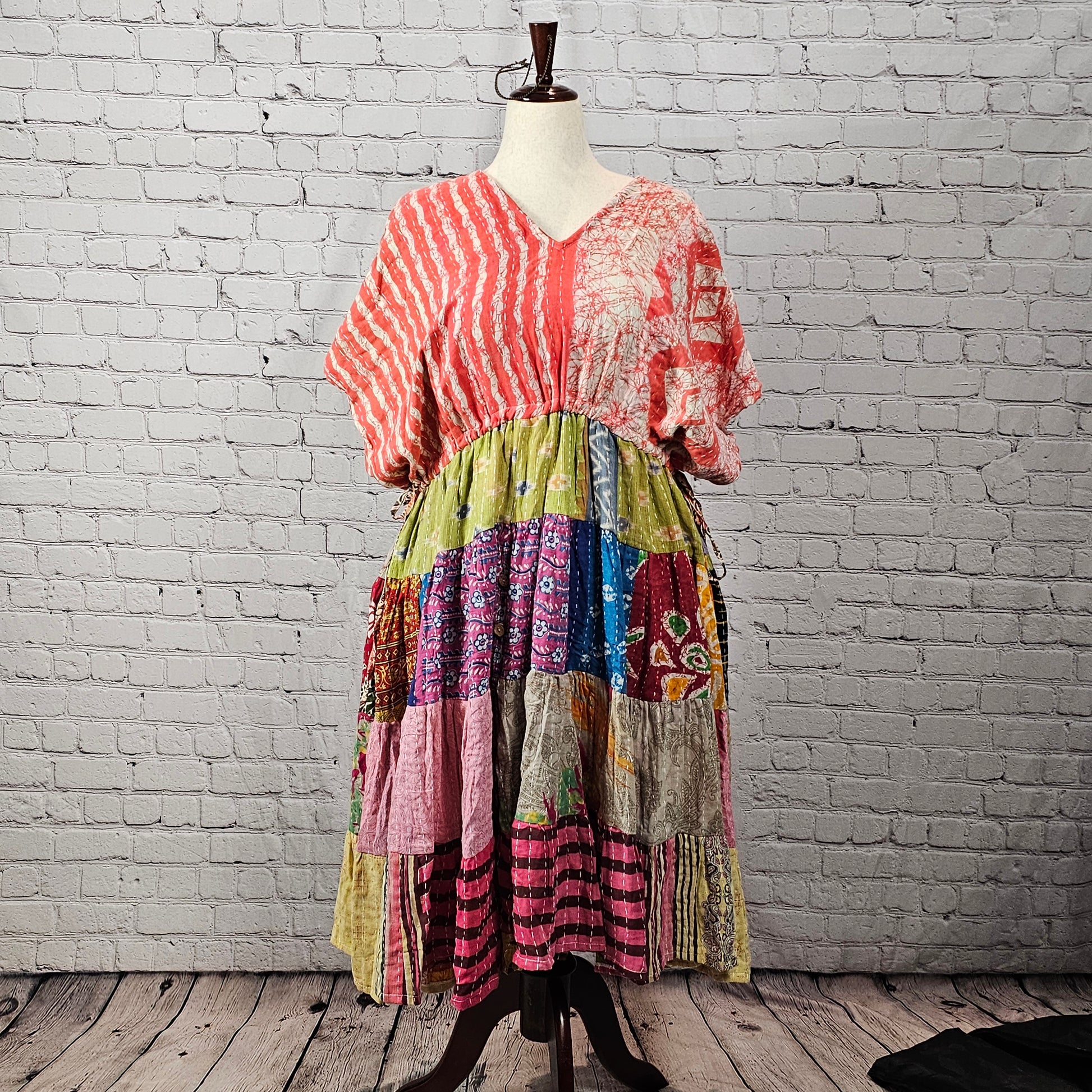 Twillow Sorbet Daydream Kantha Midi Dress with coral striped top and multicolor boho patchwork skirt accented with Kantha stitching.
