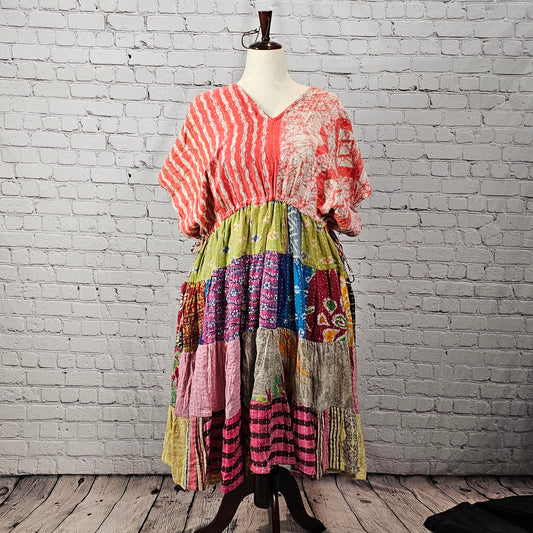 Twillow Sorbet Daydream Kantha Midi Dress with coral striped top and multicolor boho patchwork skirt accented with Kantha stitching.