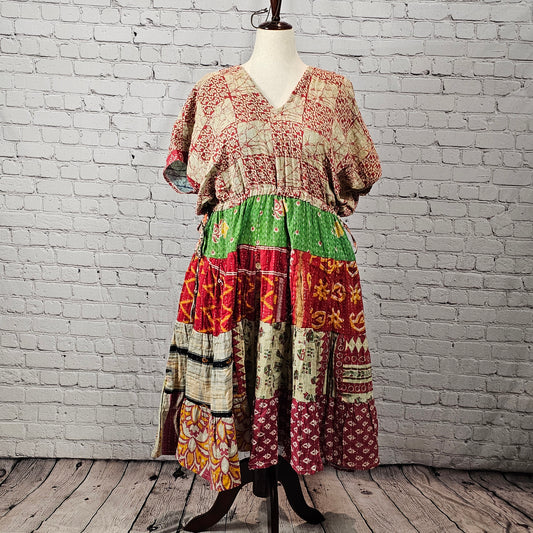 Rustic red and cream Twillow Woodland Patchwork Kantha Midi Dress with green, gold, and berry patchwork skirt and visible Kantha stitching.