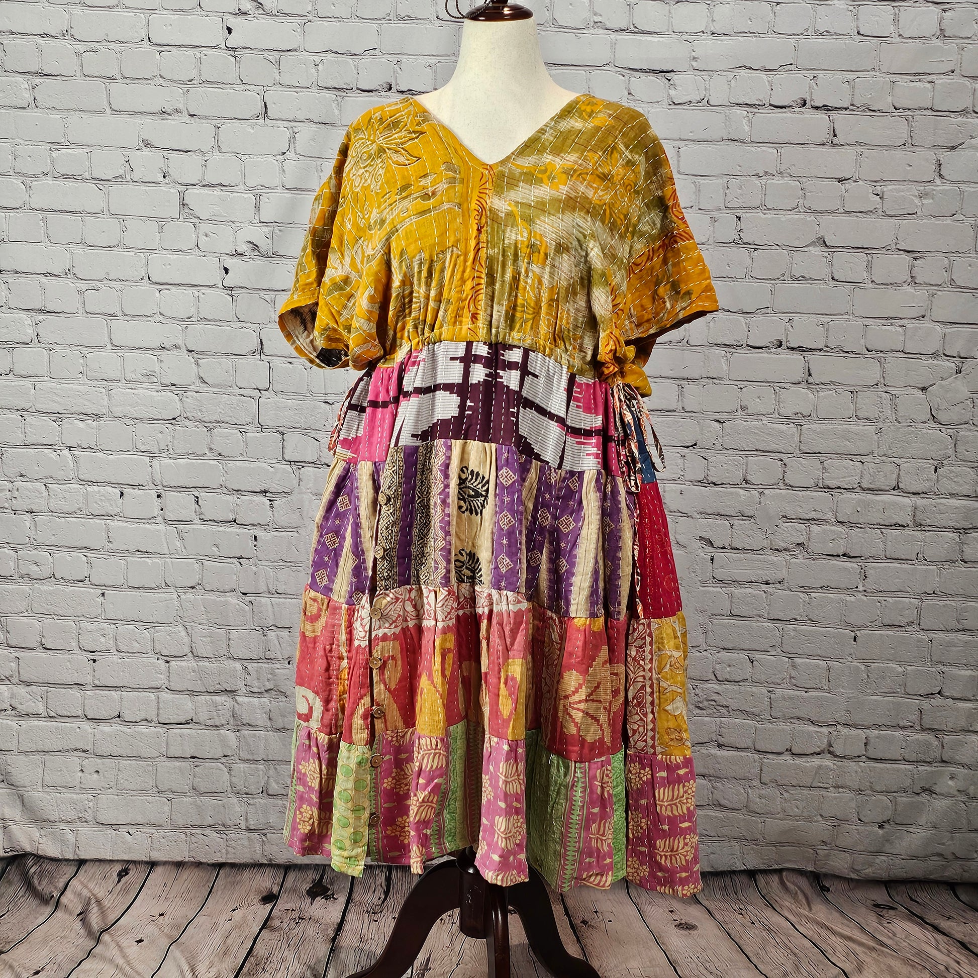 Mustard-gold Twillow Kantha Midi Dress with multicolor plum, pink, cream, and green patchwork skirt featuring Kantha stitching.