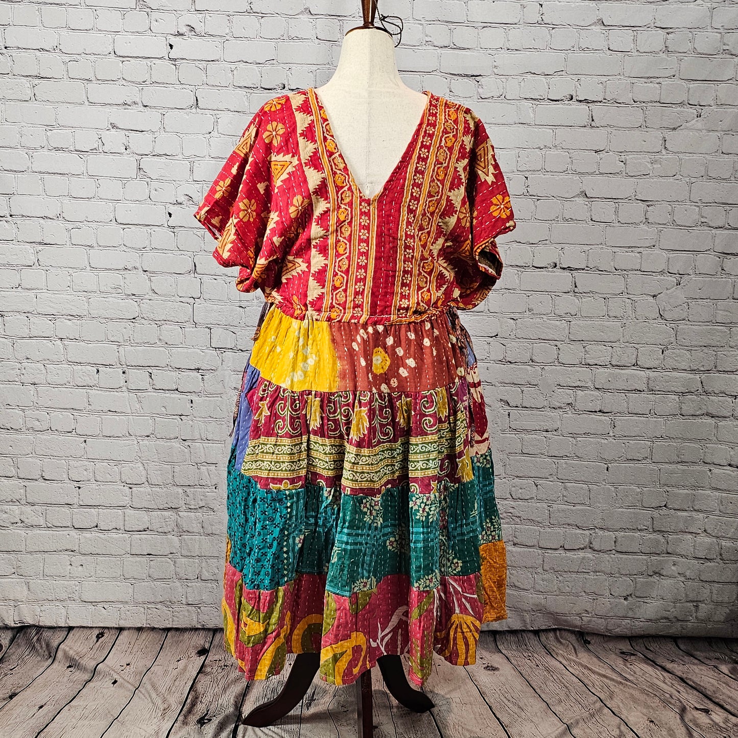 Bright red and gold Twillow Kantha Midi Dress with a colorful patchwork skirt in teal, lilac, mustard, coral, and multicolor panels featuring Kantha stitching.