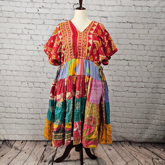 Bright red and gold Twillow Kantha Midi Dress with a colorful patchwork skirt in teal, lilac, mustard, coral, and multicolor panels featuring Kantha stitching.