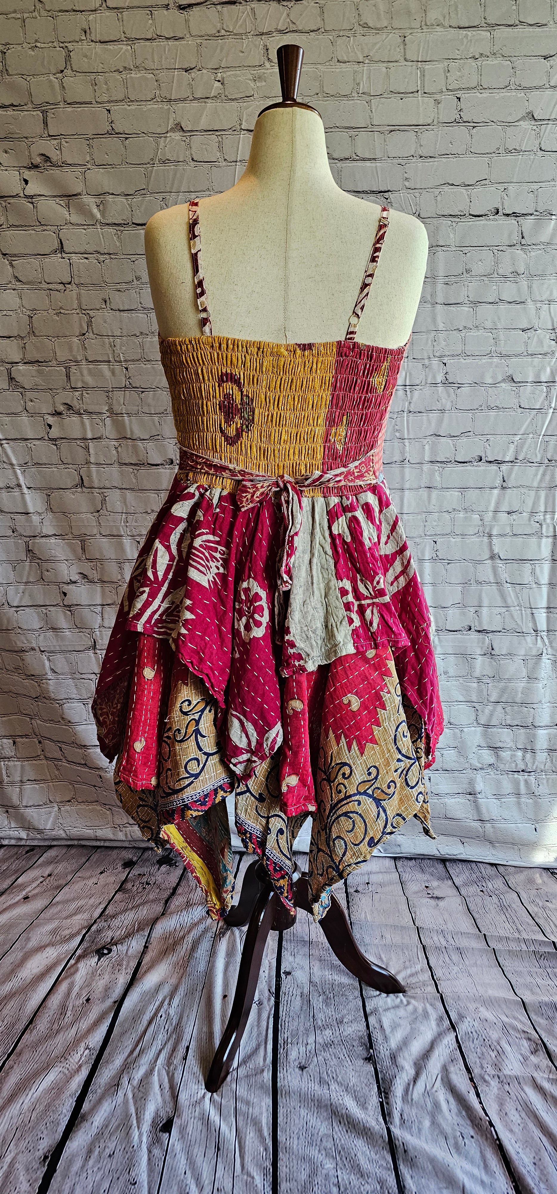 Krysta patchwork Kantha dress back view, one-of-a-kind boho fashion in handkerchief hem.