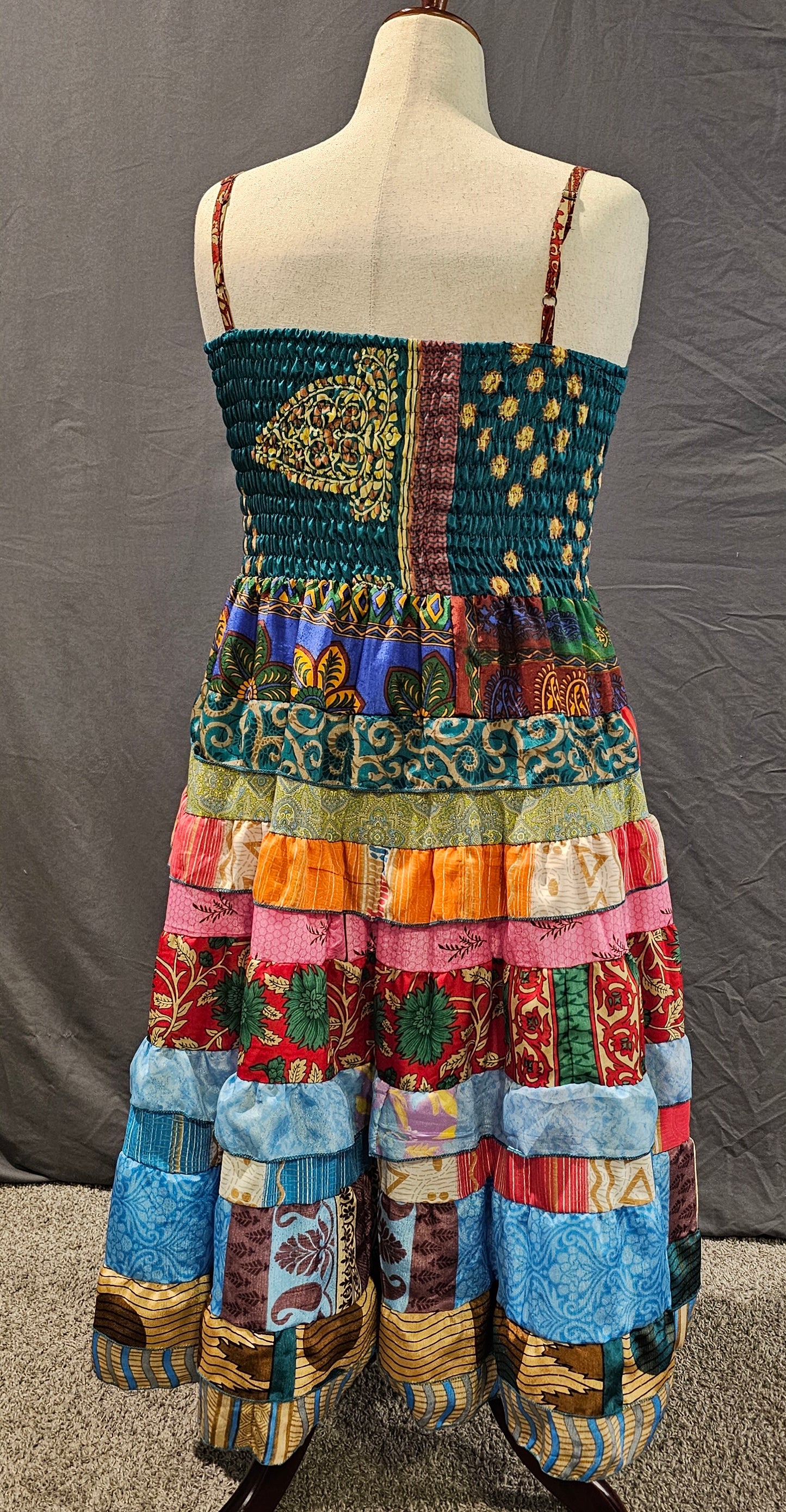 Sustainable Meadowlark sari dress back with unique recycled textile patchwork.