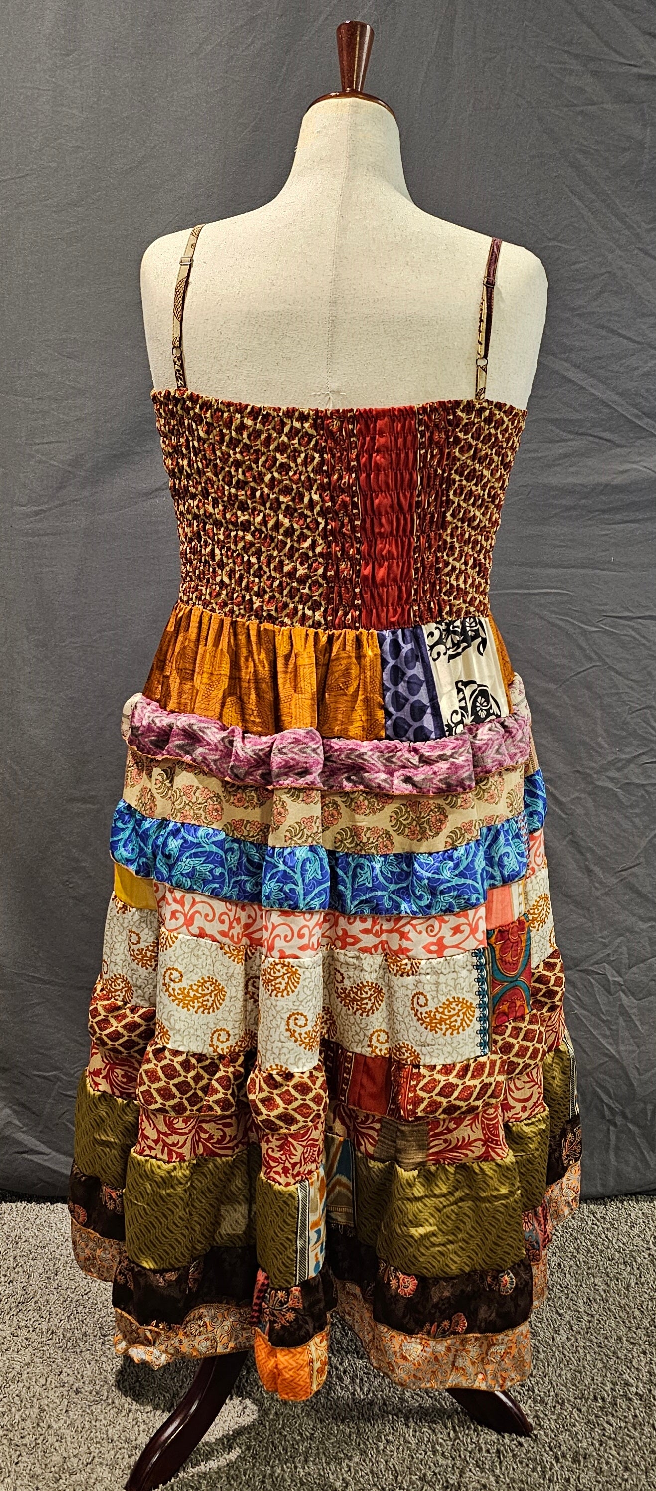 One-of-a-kind sari dress that adapts to pregnancy, postpartum, or body changes.