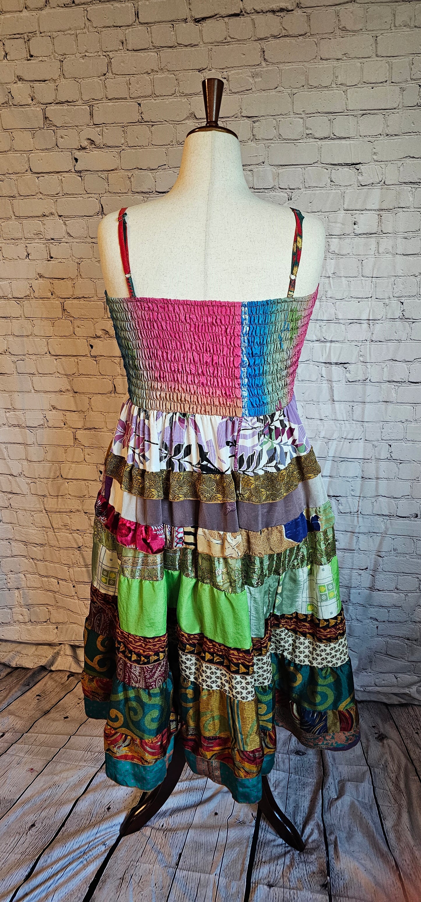 Upcycled sari dress from Wild Kantha, blending heritage textiles with modern inclusive design.