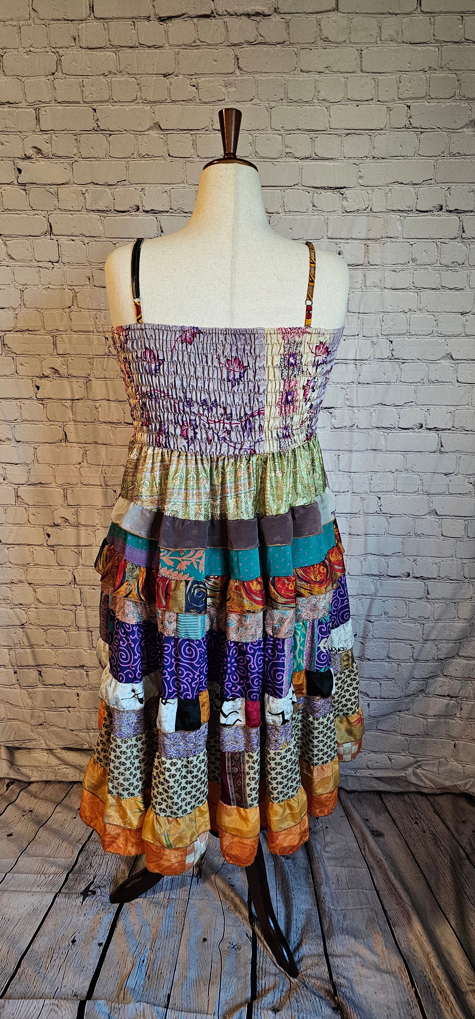 Sustainable Meadowlark sari dress back with unique recycled textile patchwork.

