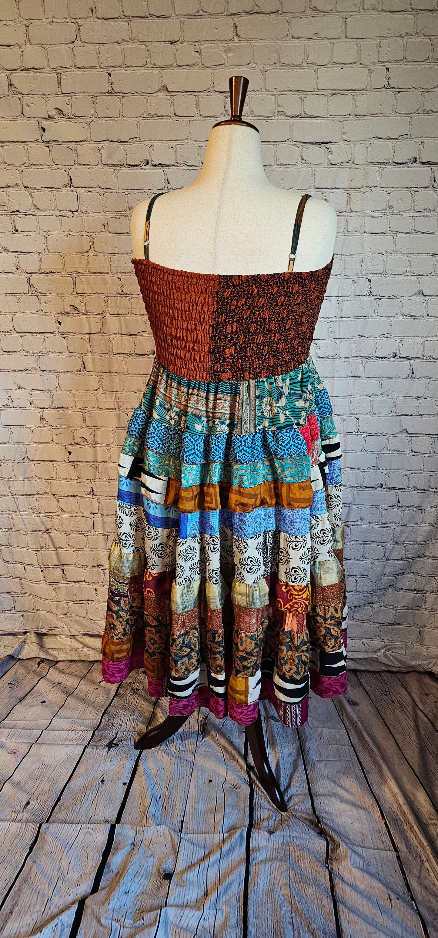Bohemian one-of-a-kind recycled sari dress back with flowing fit.