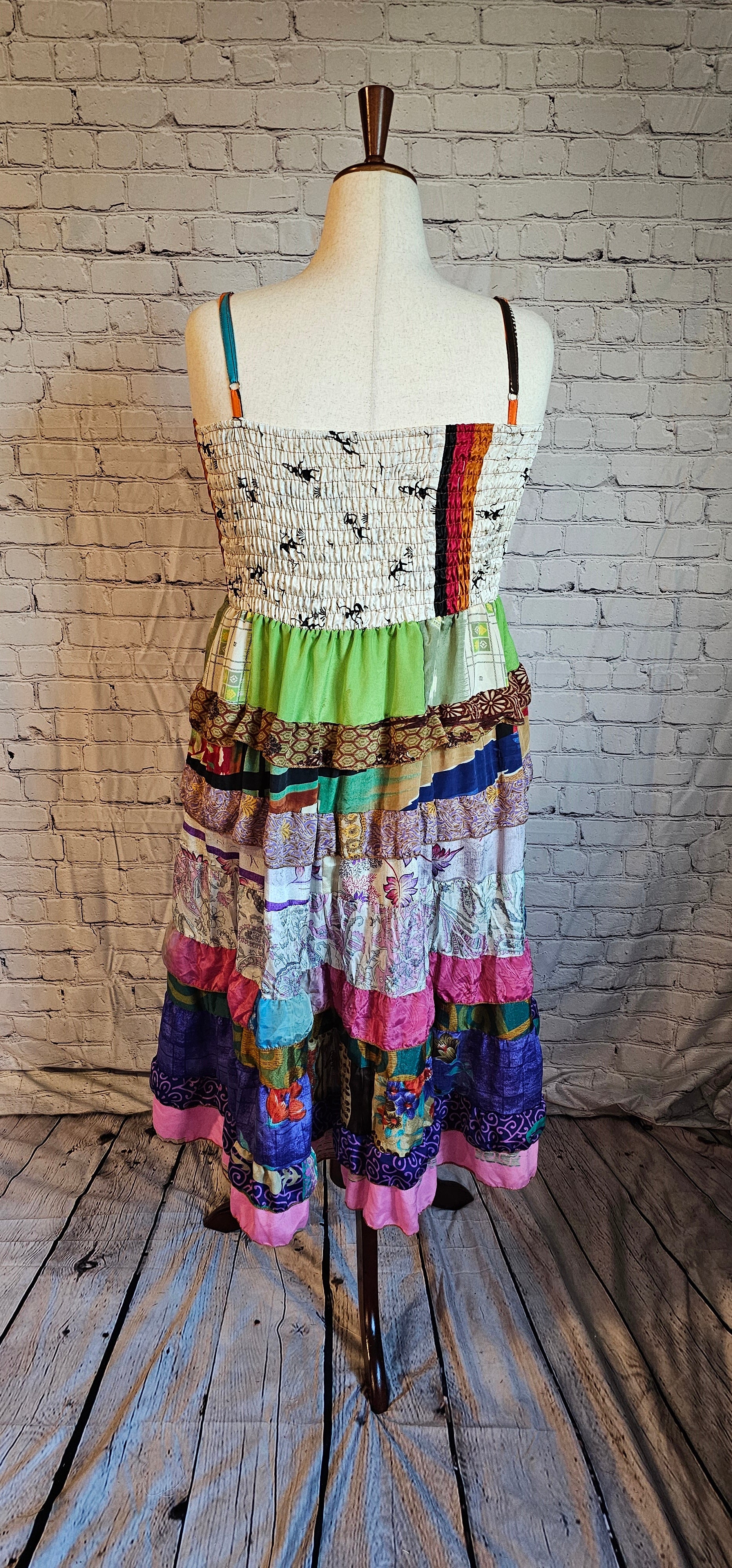Inclusive-fit sari dress back made from recycled textiles, designed to move with you.