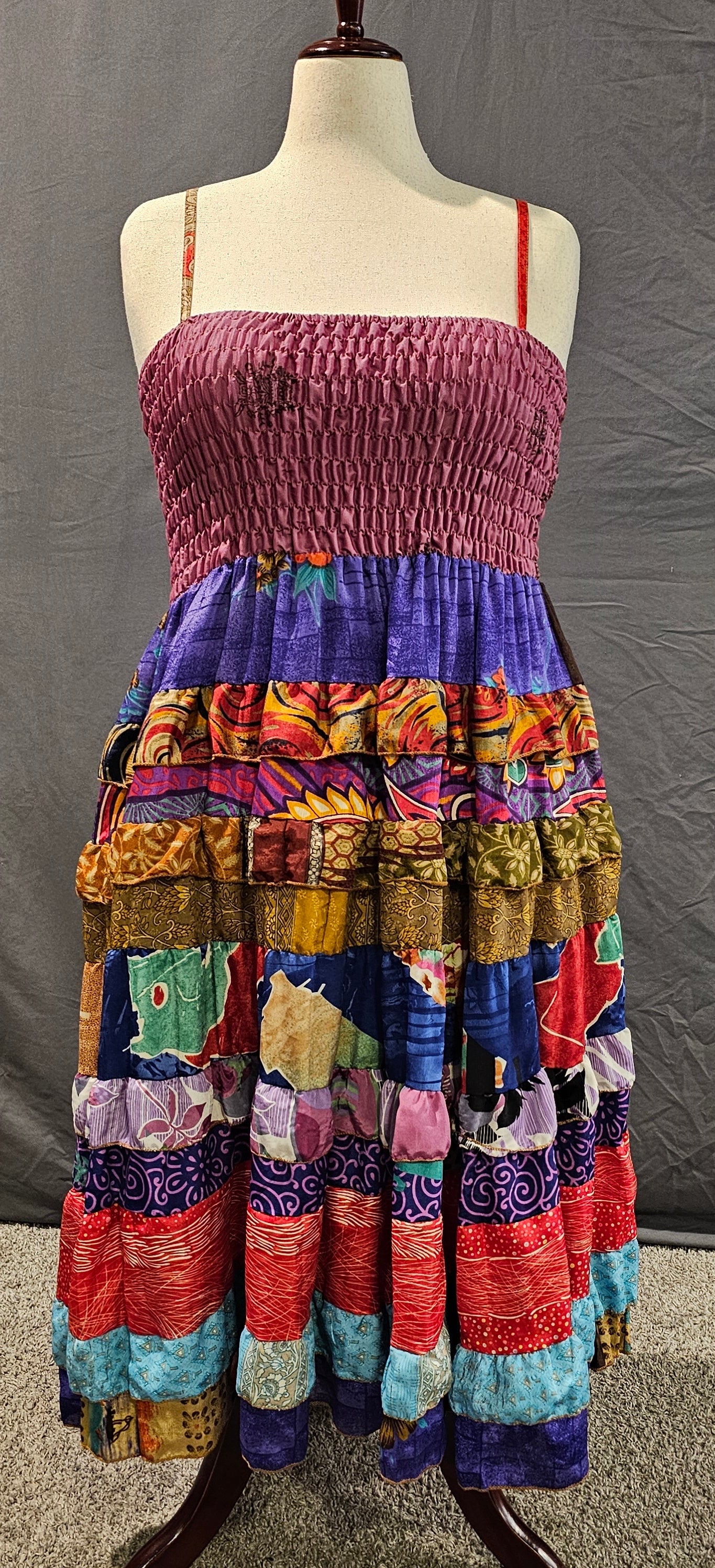 Meadowlark boho patchwork tiered dress in berry, violet, and gold, one-of-a-kind sustainable fashion.