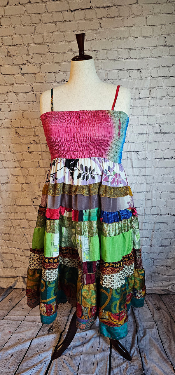 Inclusive-fit sari dress front made from recycled textiles, designed to move with you.