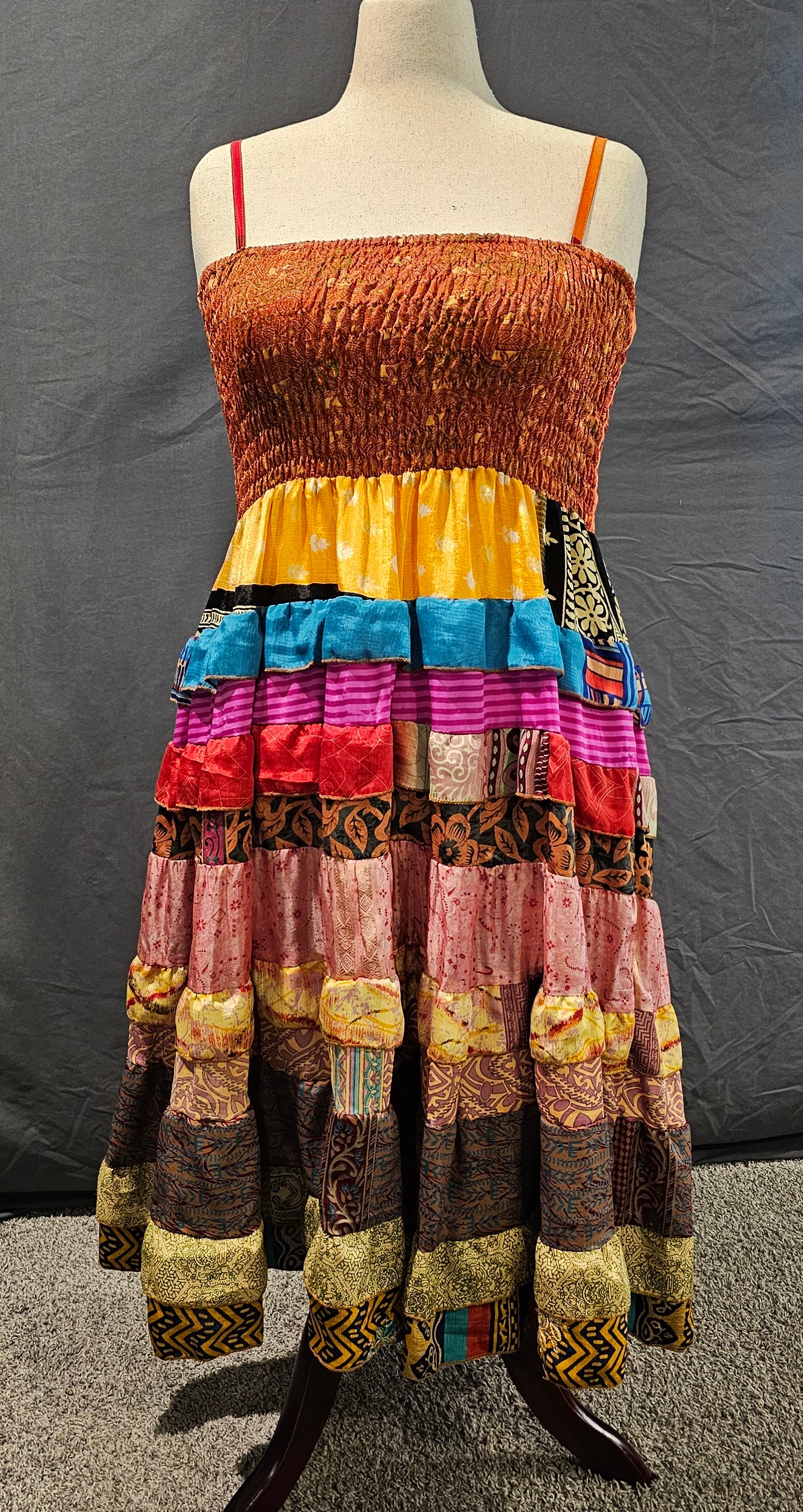 One-of-a-kind sari dress front that adapts to pregnancy, postpartum, or body changes.