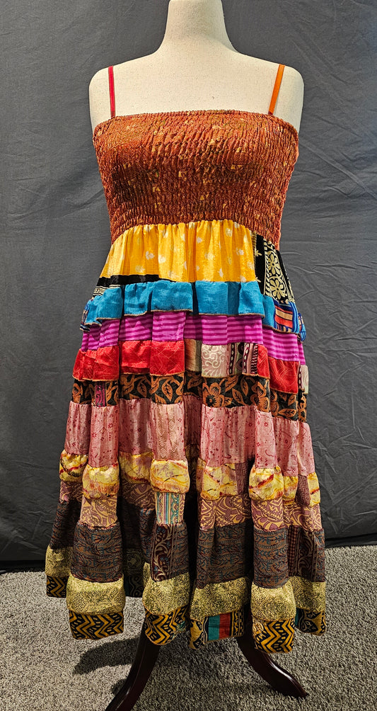 One-of-a-kind sari dress front that adapts to pregnancy, postpartum, or body changes.