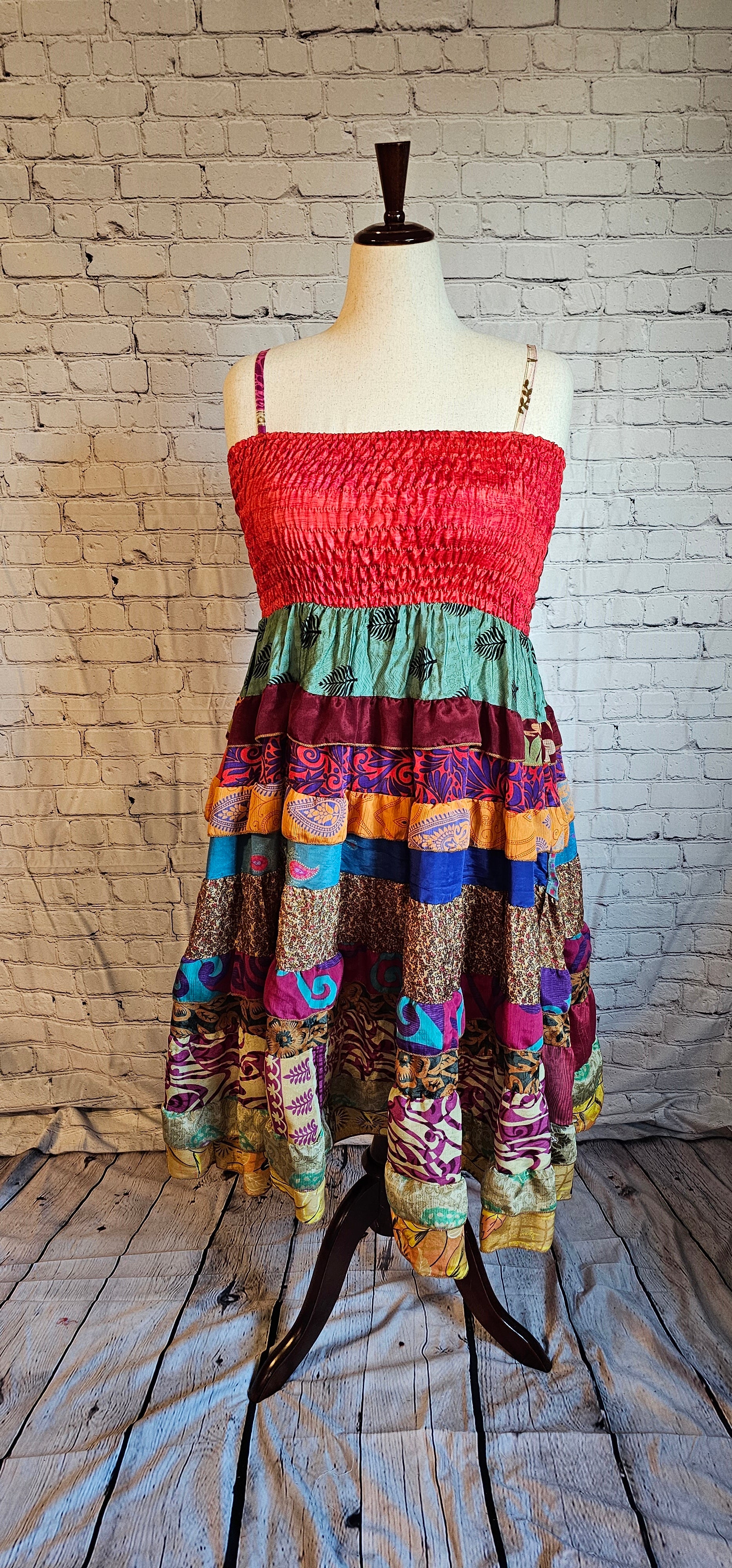 Size-inclusive boho dress made from recycled sari textiles, designed to flatter every body shown on mannequin.