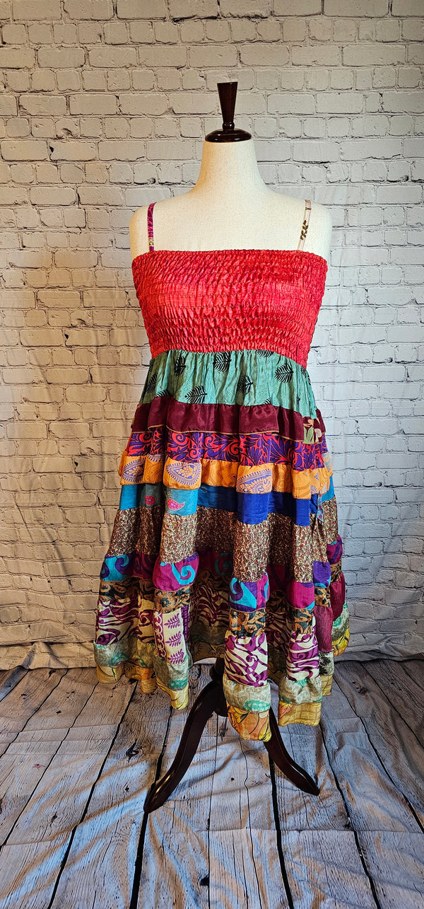Size-inclusive boho dress made from recycled sari textiles, designed to flatter every body shown on mannequin.