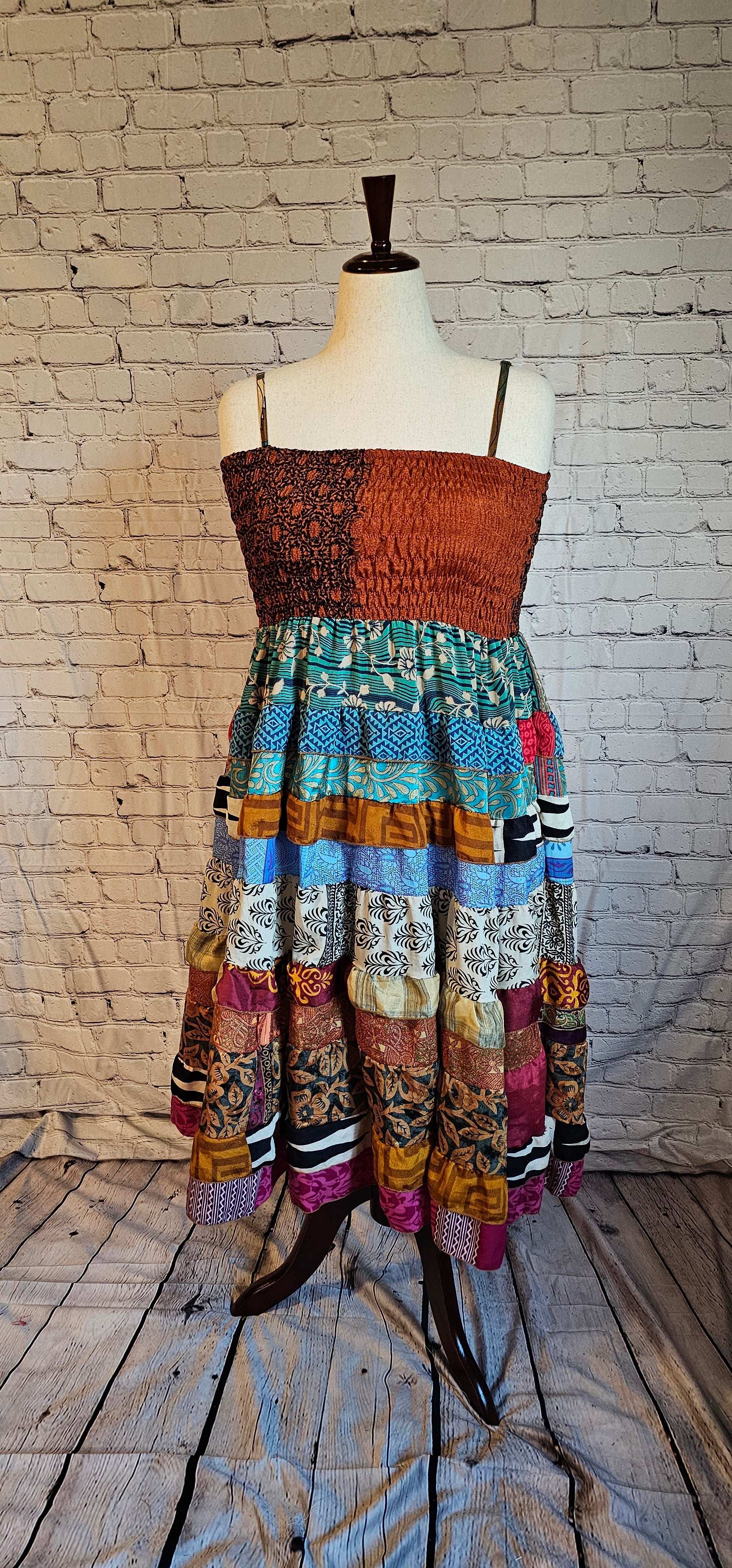 Boho-inspired sari dress, part of Wild Kantha’s sustainable fashion collection shown on mannequin.