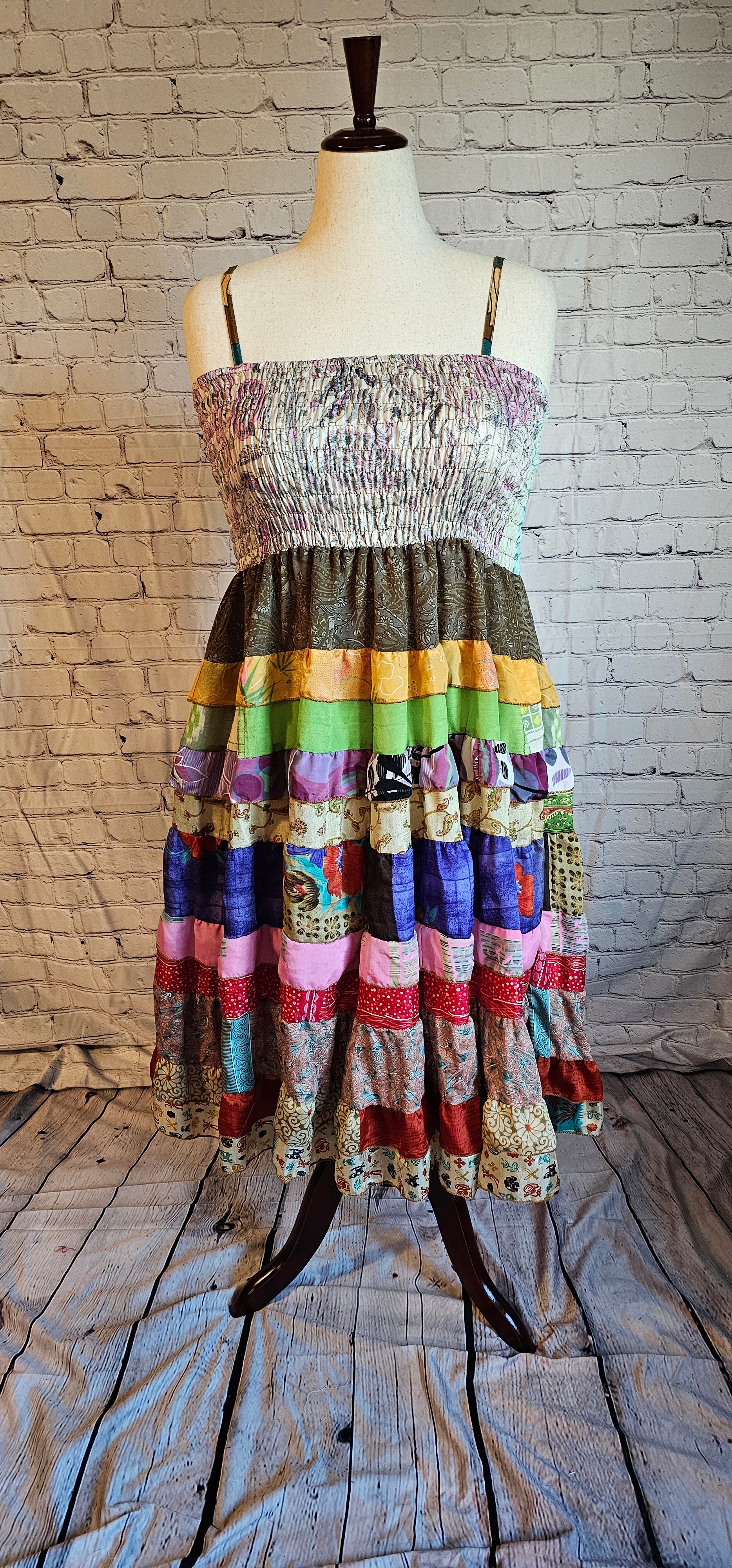 Eco-friendly bohemian patchwork sari dress front crafted from upcycled textiles.