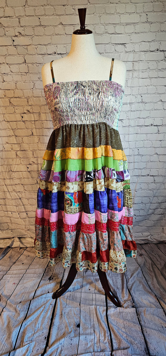 Eco-friendly bohemian patchwork sari dress front crafted from upcycled textiles.