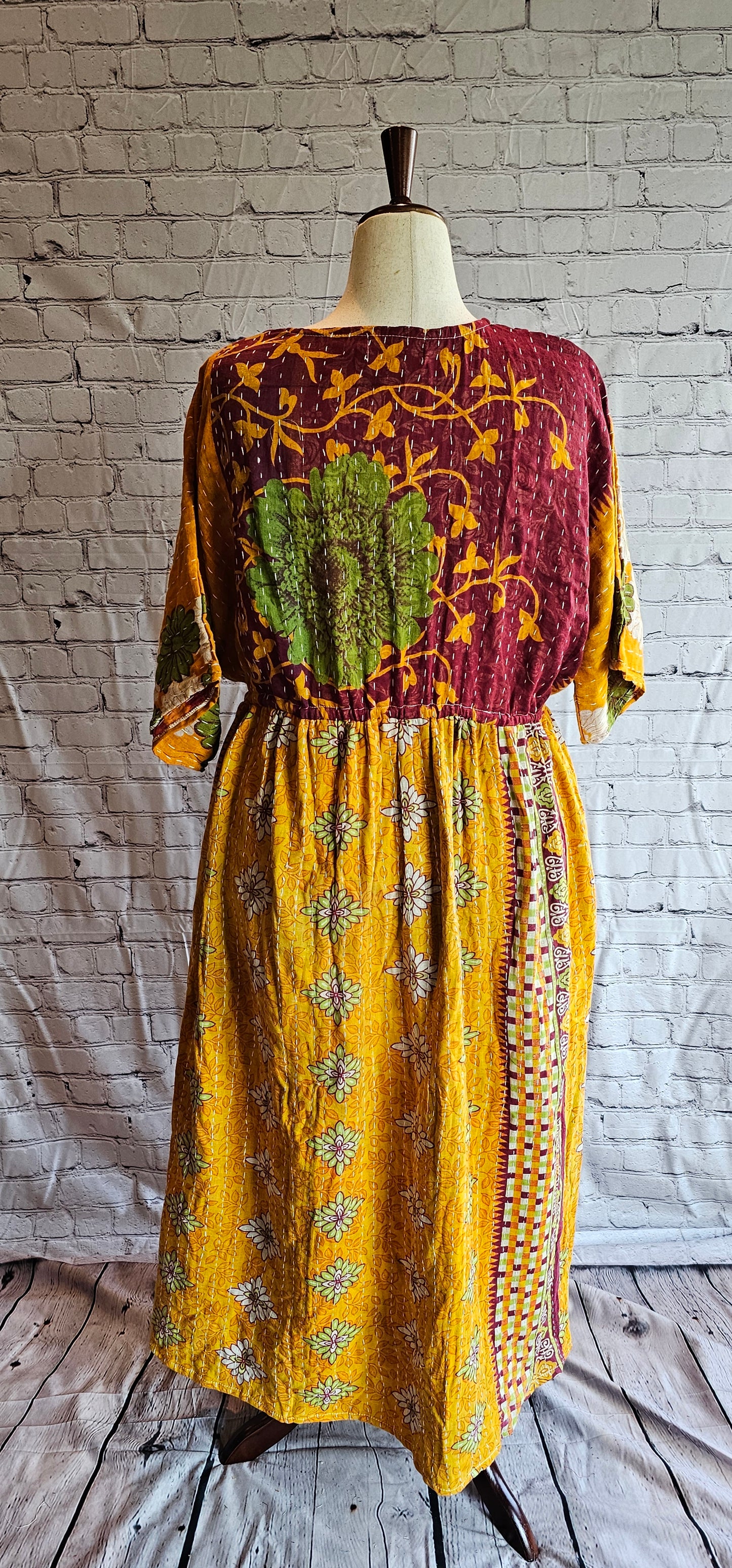 Mosswynd cotton Kantha dress back, bohemian patchwork design with flowing fit.