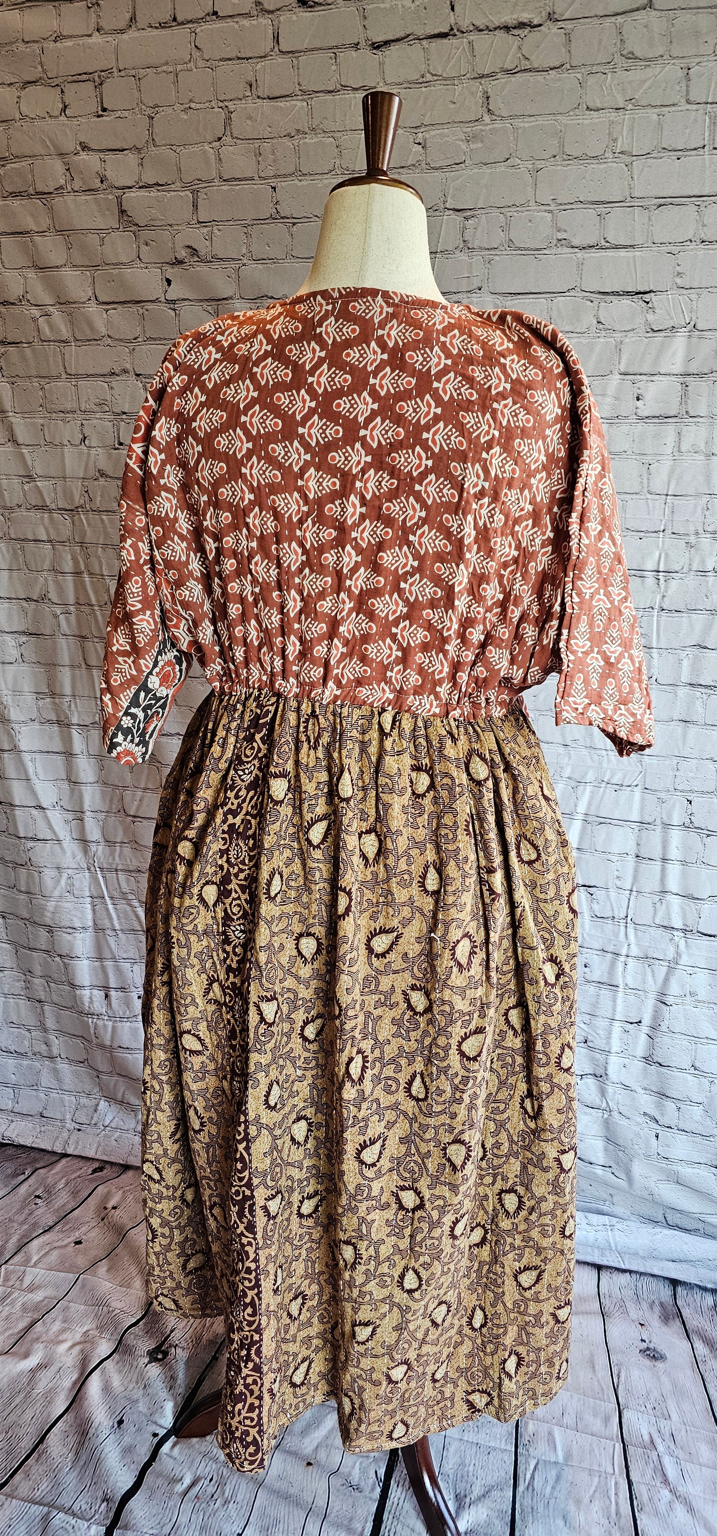 Front view of Mosswynd cotton Kantha patchwork dress, recycled sari fashion shown on mannequin.