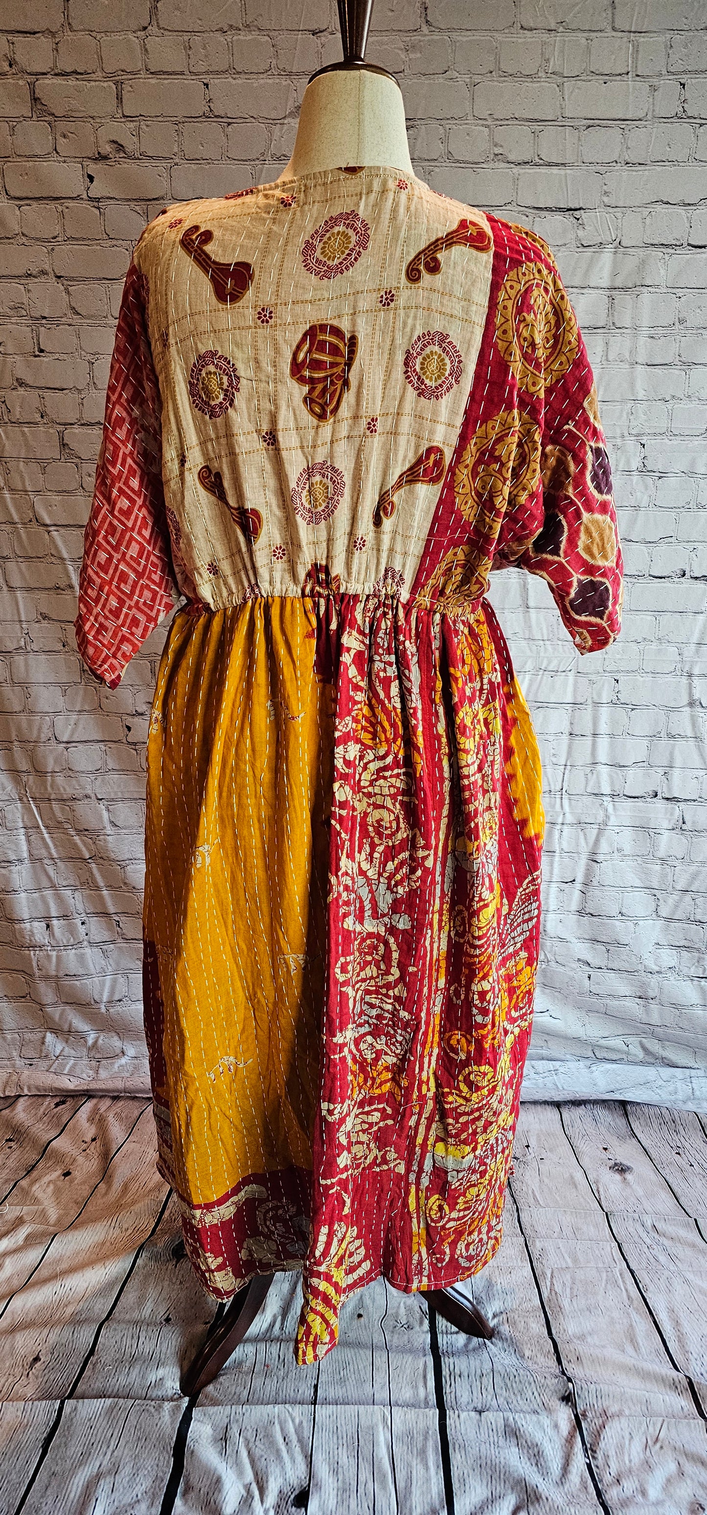 Mosswynd Kantha dress in cotton, one-of-a-kind patchwork detail shown on mannequin.