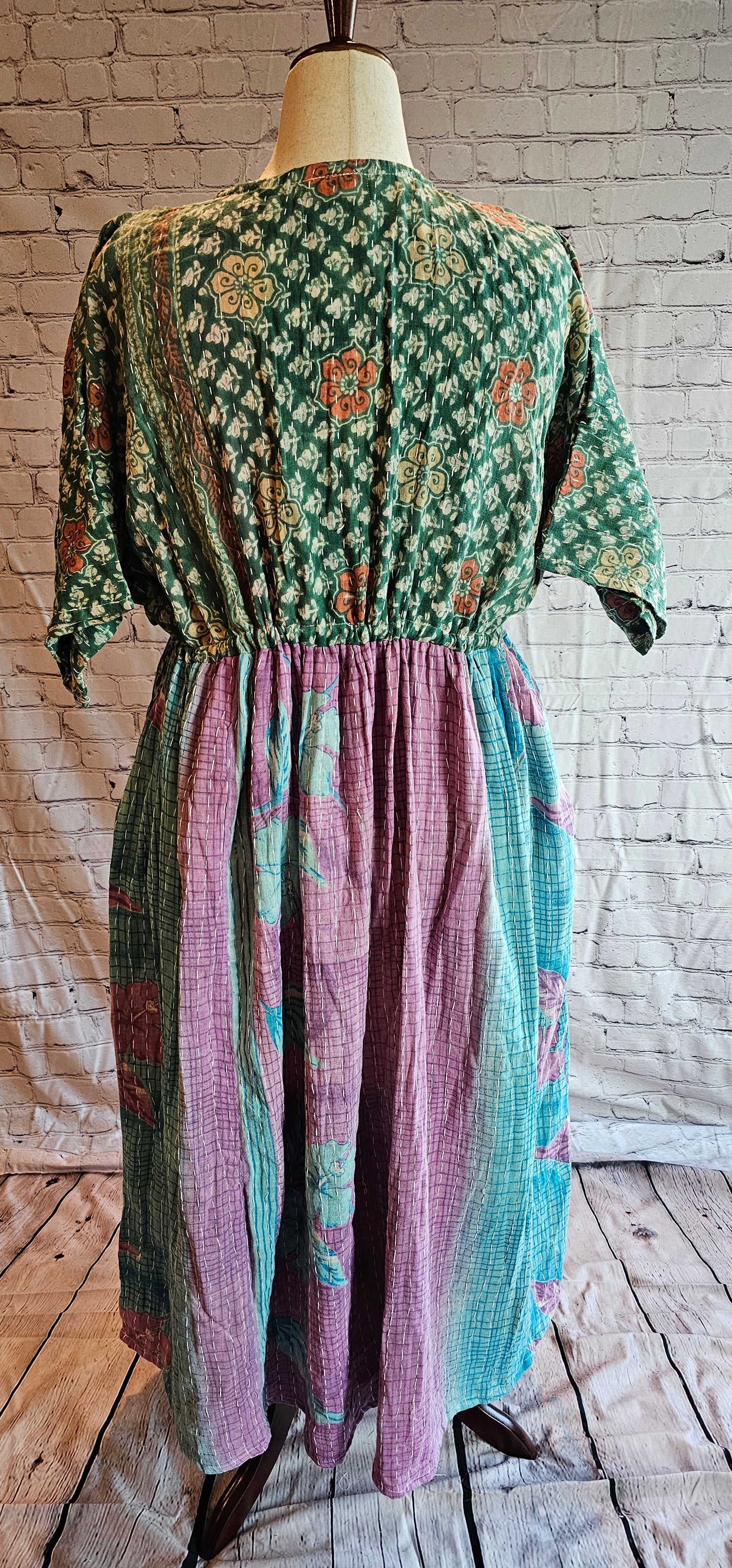 Back view of Mosswynd Kantha patchwork dress, one-of-a-kind sustainable fashion piece.