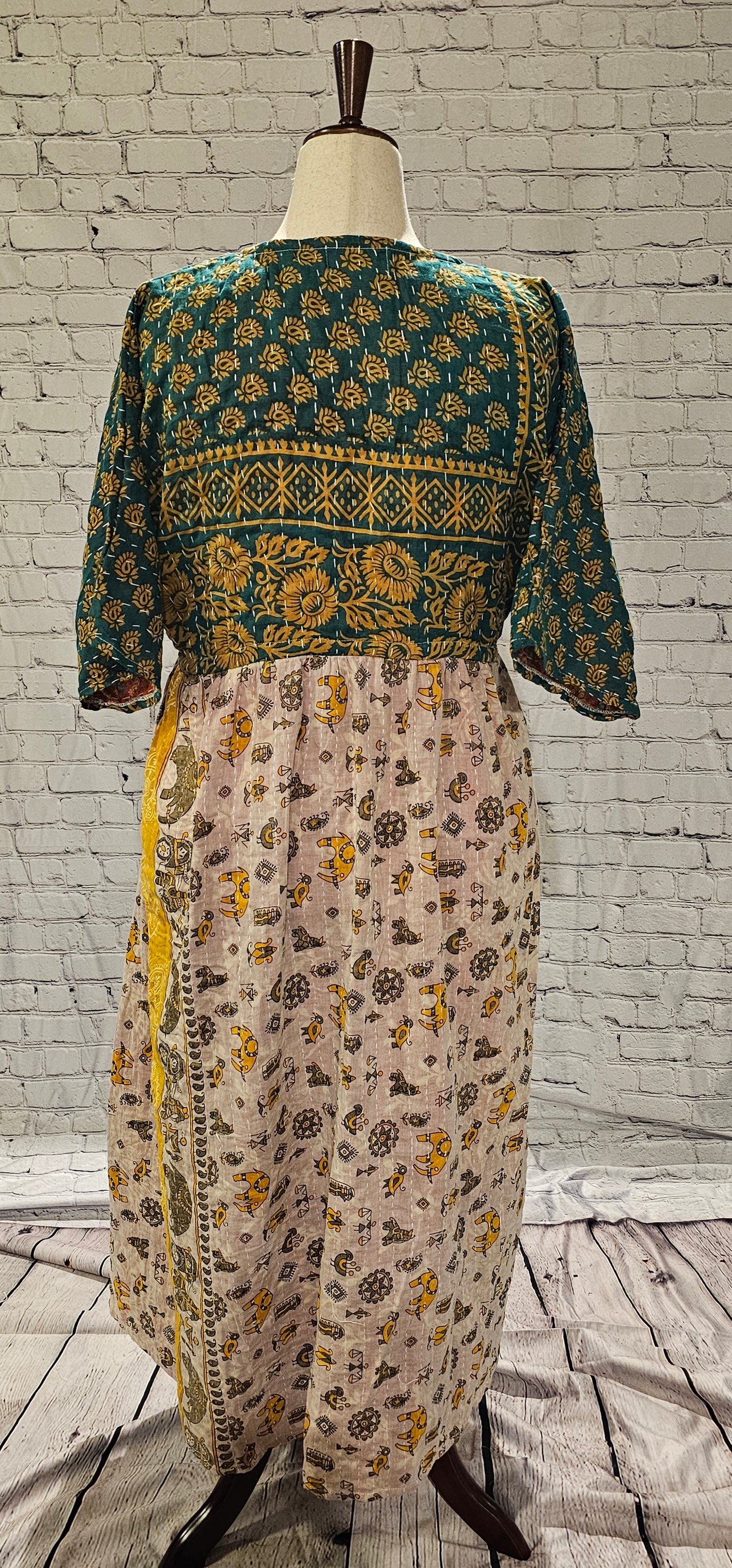 Back of bohemian cotton Kantha dress back with free-size adaptable fit.