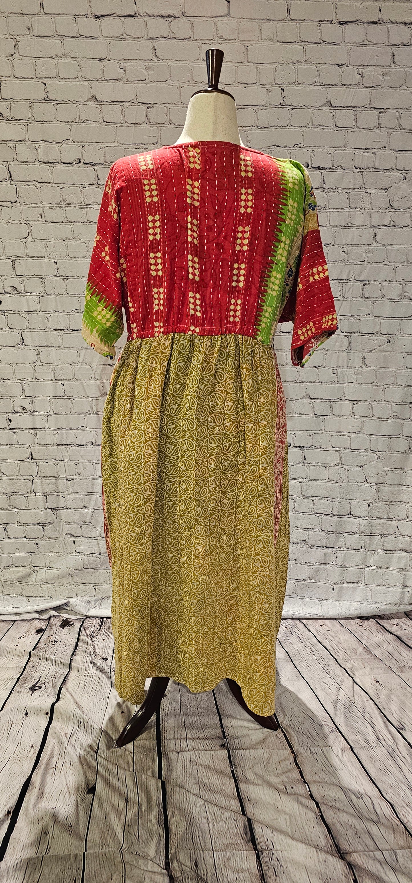 Kantha stitching on Mosswynd cotton dress back, made recycled sari fabric.