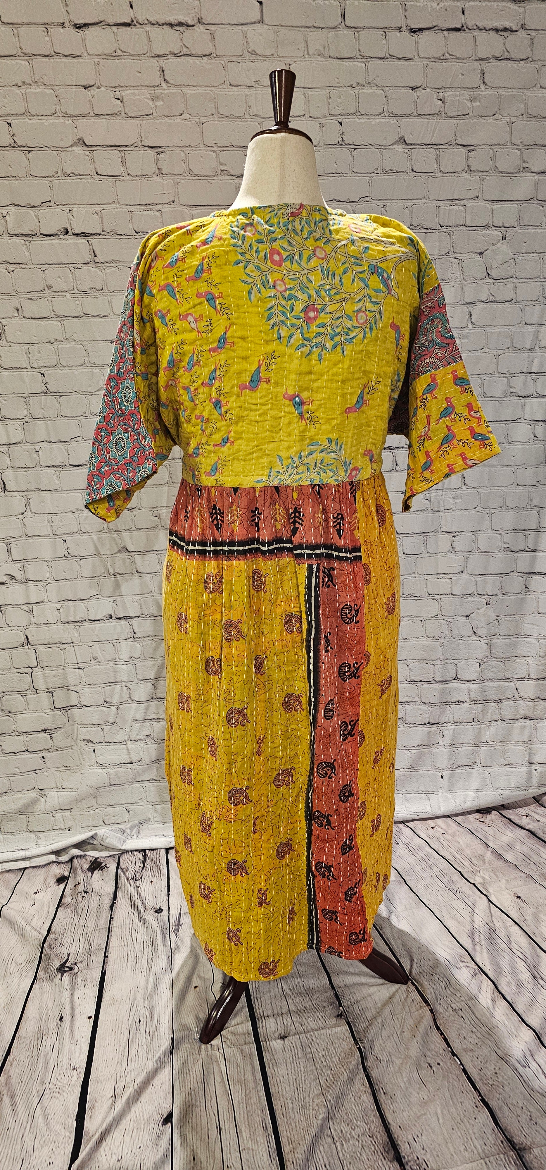 Back of bohemian cotton Kantha dress back with free-size adaptable fit.