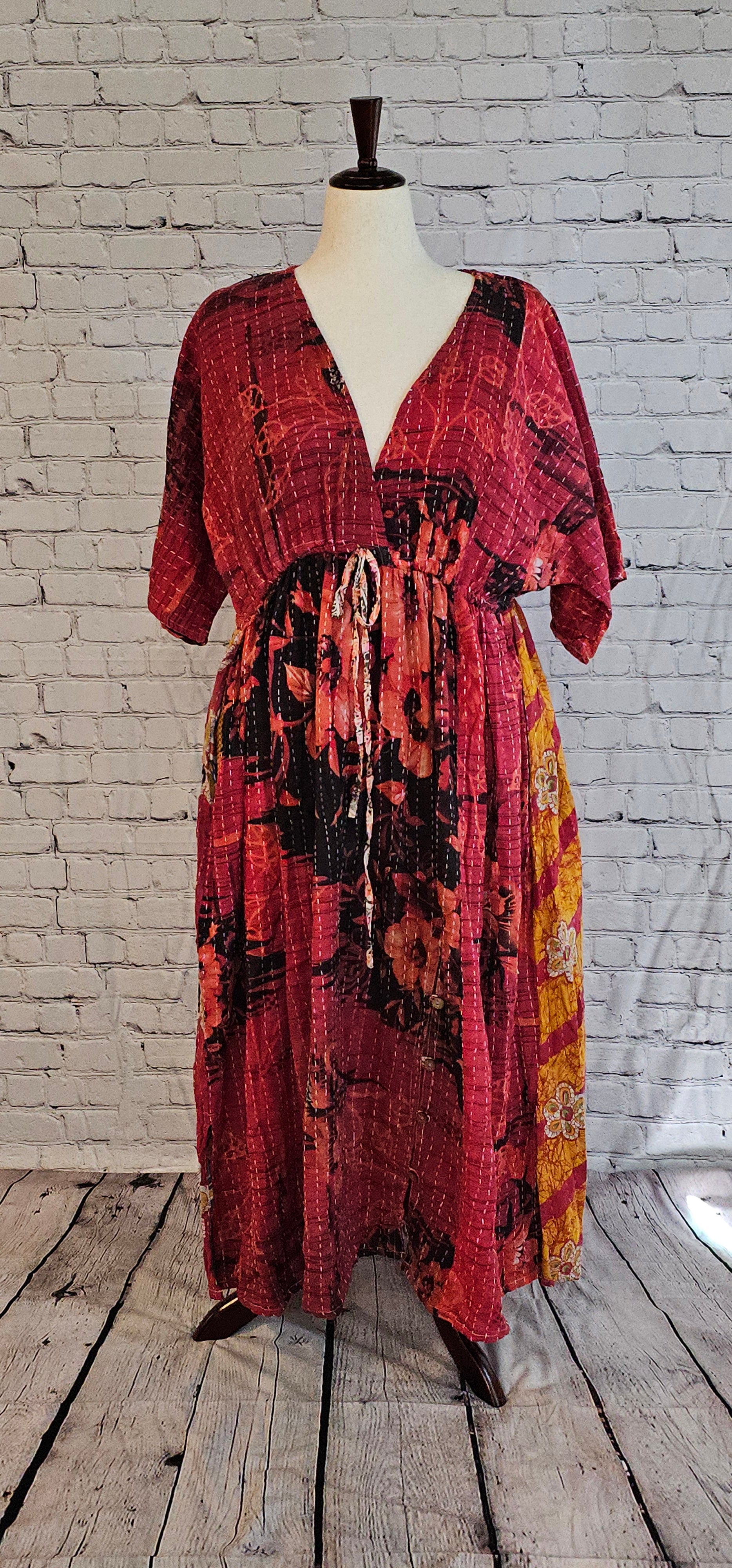 Front view of Mosswynd Kantha dress, sustainable bohemian patchwork made from recycled sari fabric.