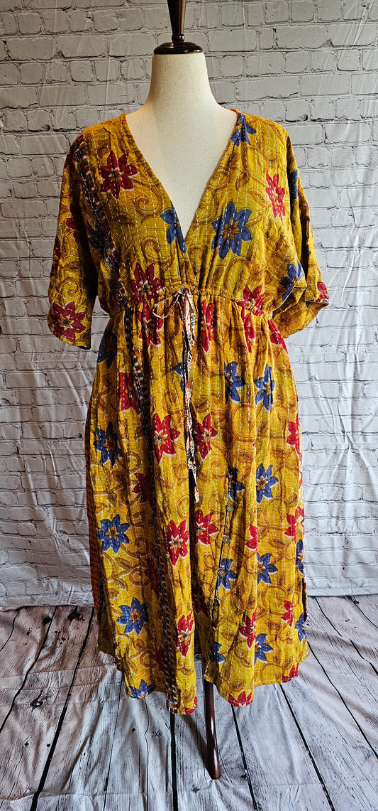 Sustainable cotton Kantha patchwork dress, one-of-a-kind boho fashion shown on mannequin.