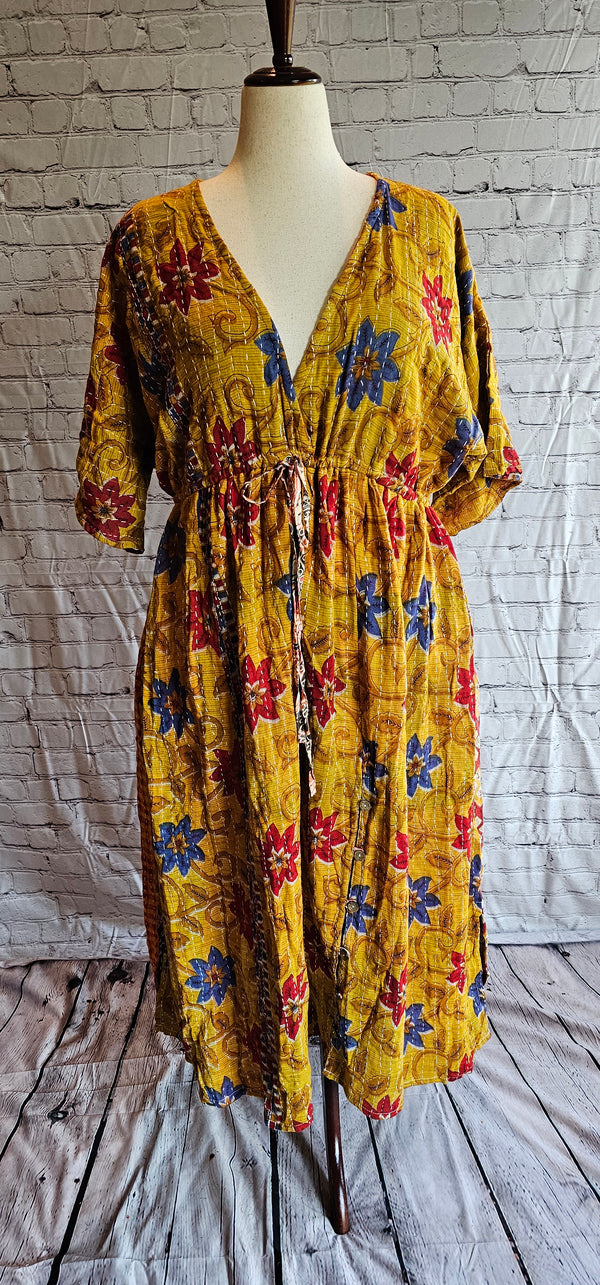 Sustainable cotton Kantha patchwork dress, one-of-a-kind boho fashion shown on mannequin.