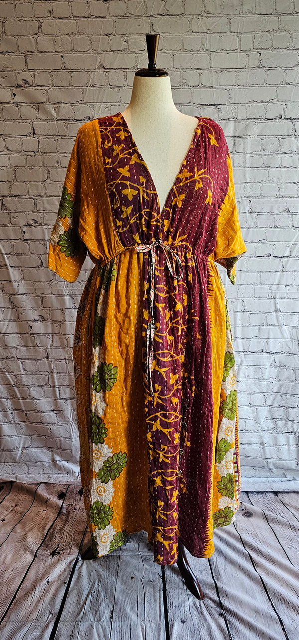 Front view of Mosswynd cotton Kantha patchwork dress, recycled sari fashion shown on mannequin.