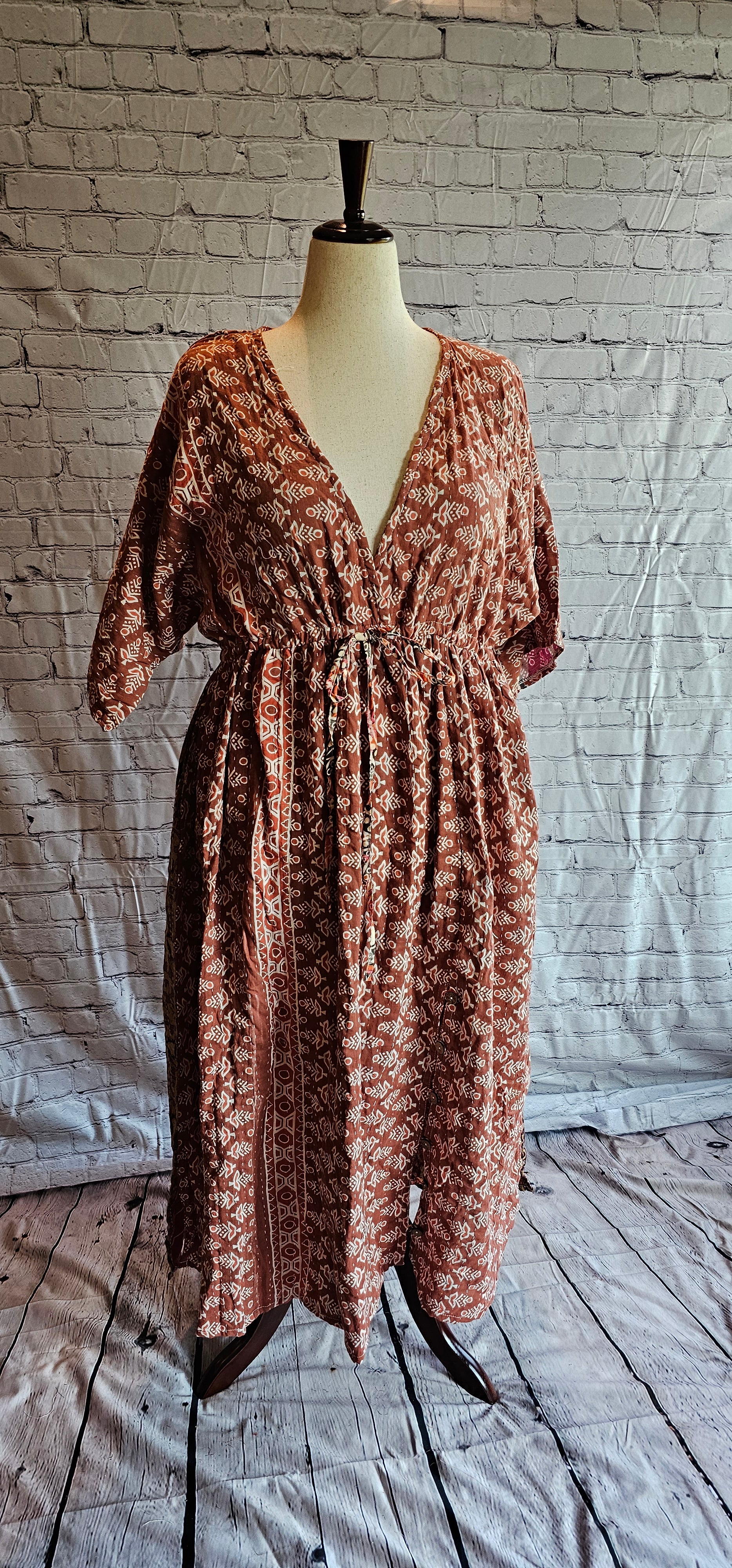 Kantha stitching on Mosswynd cotton dress, made from recycled sari fabric shown on mannequin.