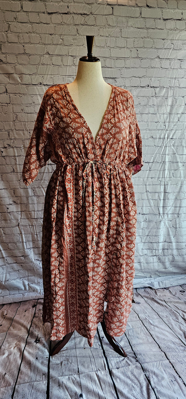 Kantha stitching on Mosswynd cotton dress, made from recycled sari fabric shown on mannequin.