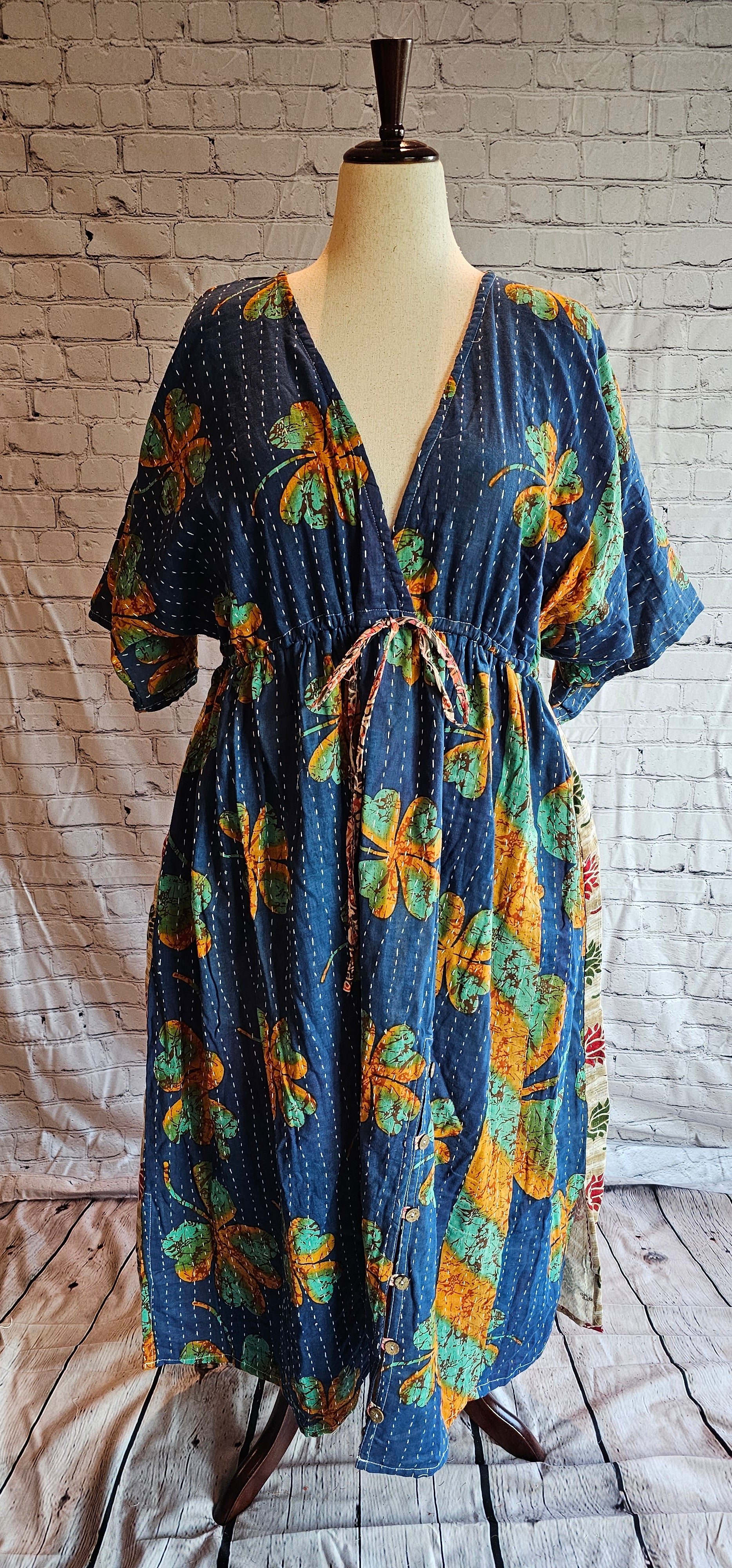 Sustainable cotton Kantha dress for boho wardrobe, eco-conscious and shown on mannequin.