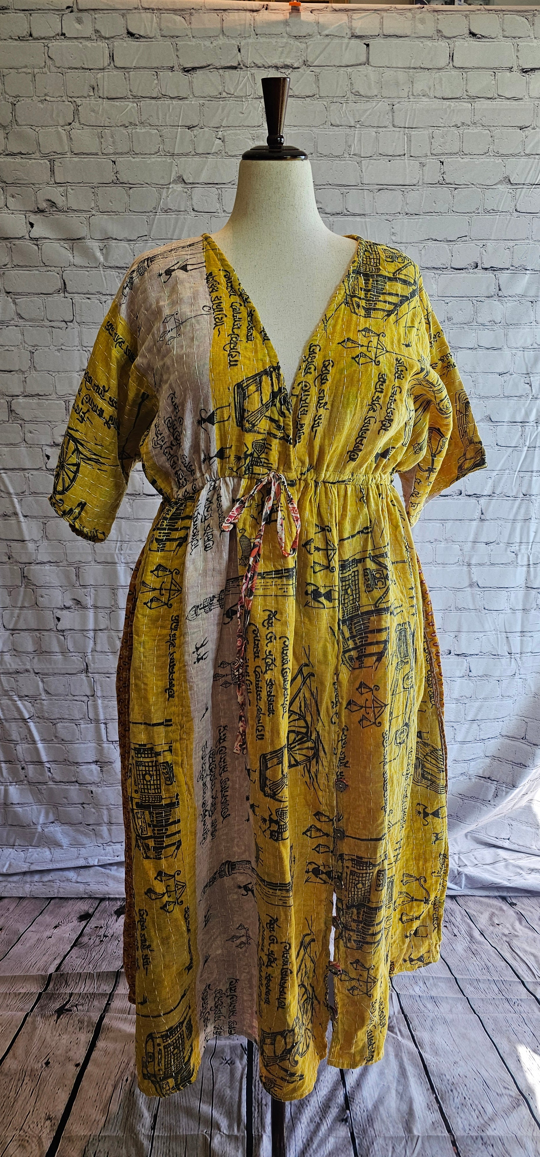 Front view of Mosswynd cotton Kantha dress, sustainable bohemian patchwork design made from recycled saris.